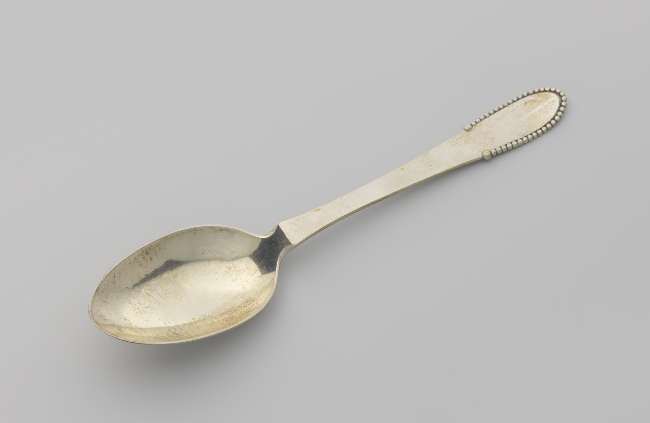 Lepel by Georg Jensen, metal silverware showcasing elegant curves and lines