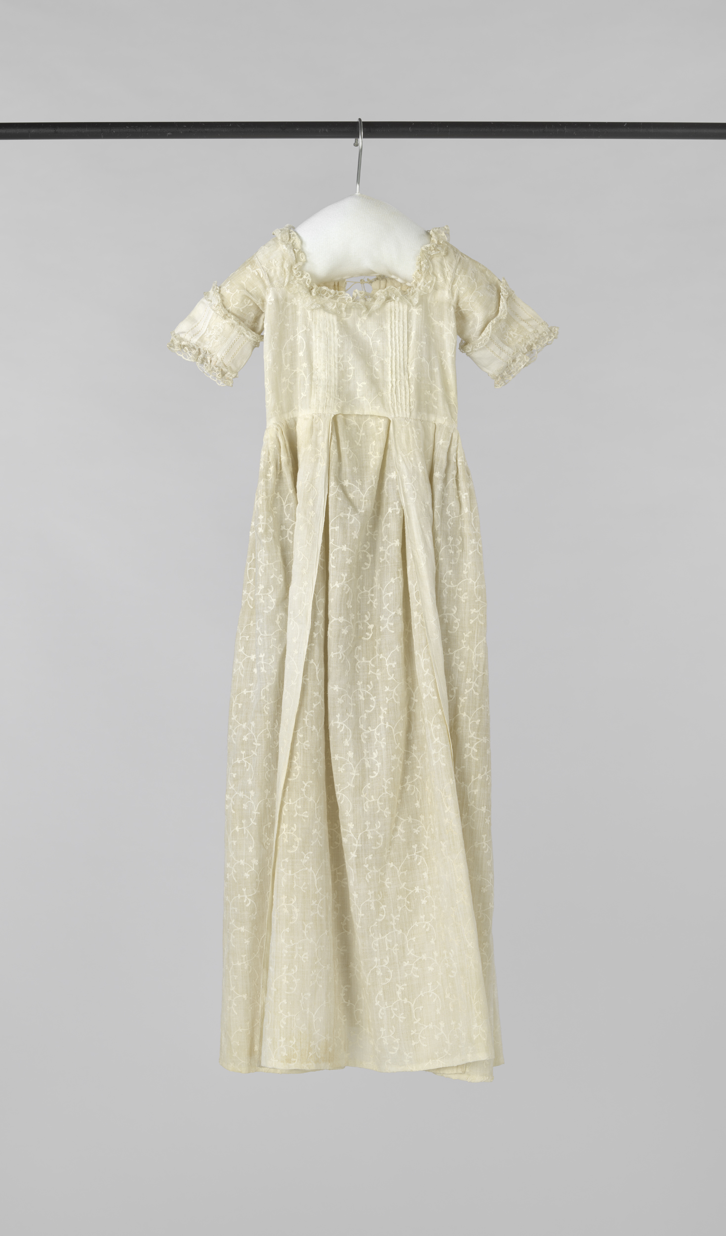 Victorian textile baptismal gown with intricate embroidery by unknown artist