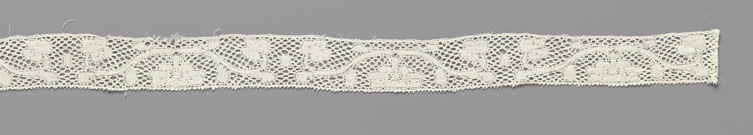 Lace work featuring floral motifs by Unknown Artist