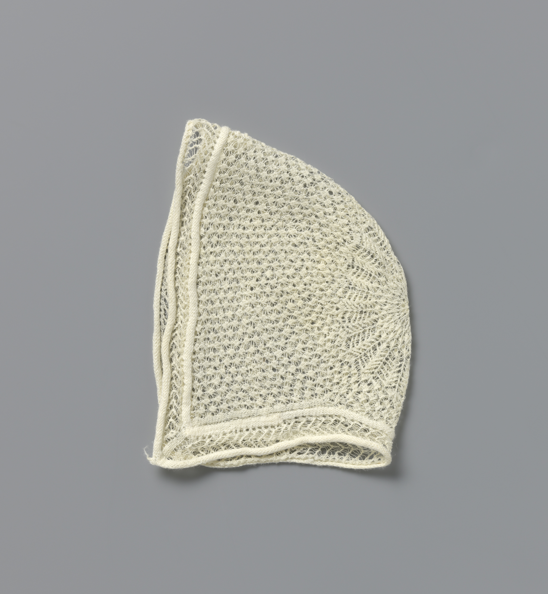 Textile work by Unknown Artist, featuring a star-shaped white cotton design.