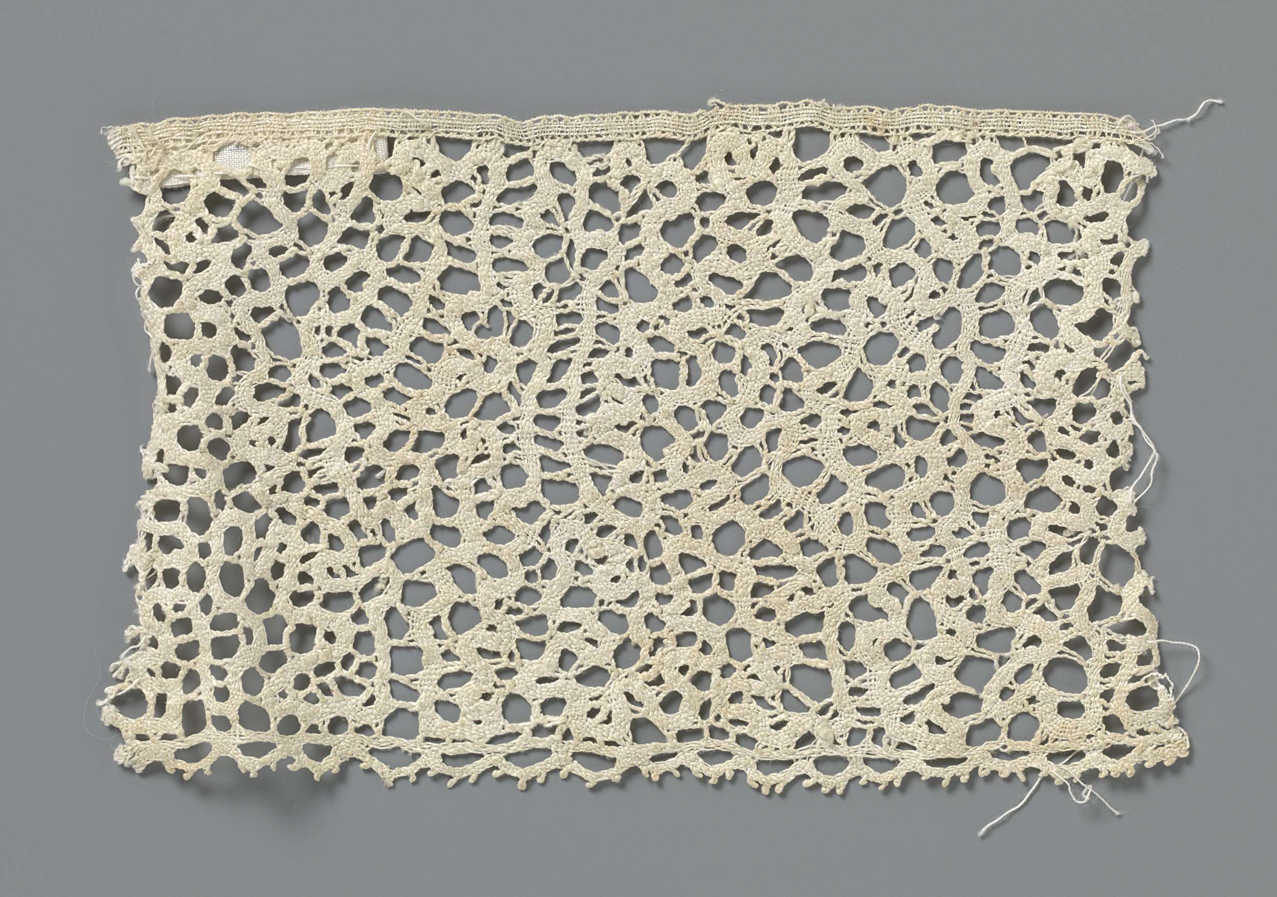 Intricate lace work by Unknown Artist, c. 1890, showcasing complex patterns and textures.