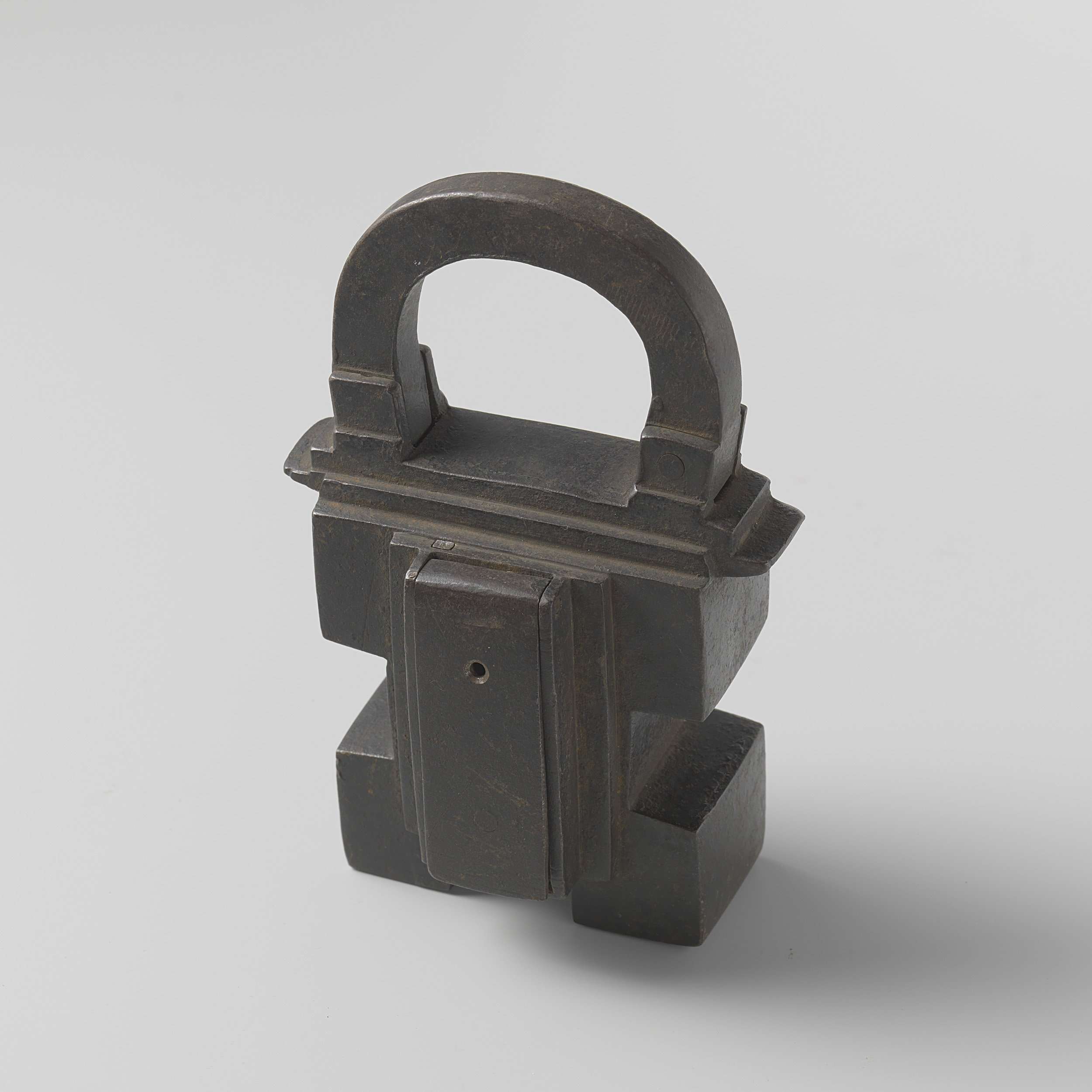 A metal padlock hanging against a muted background by Unknown Artist