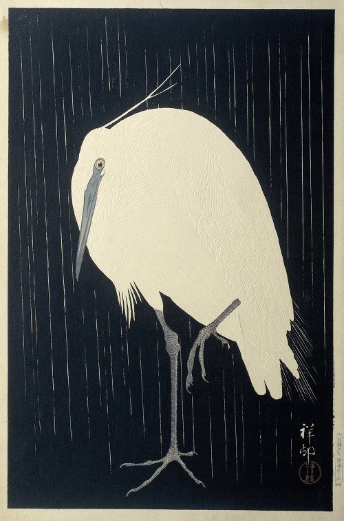 A serene depiction of an egret in the rain by Ohara Koson.