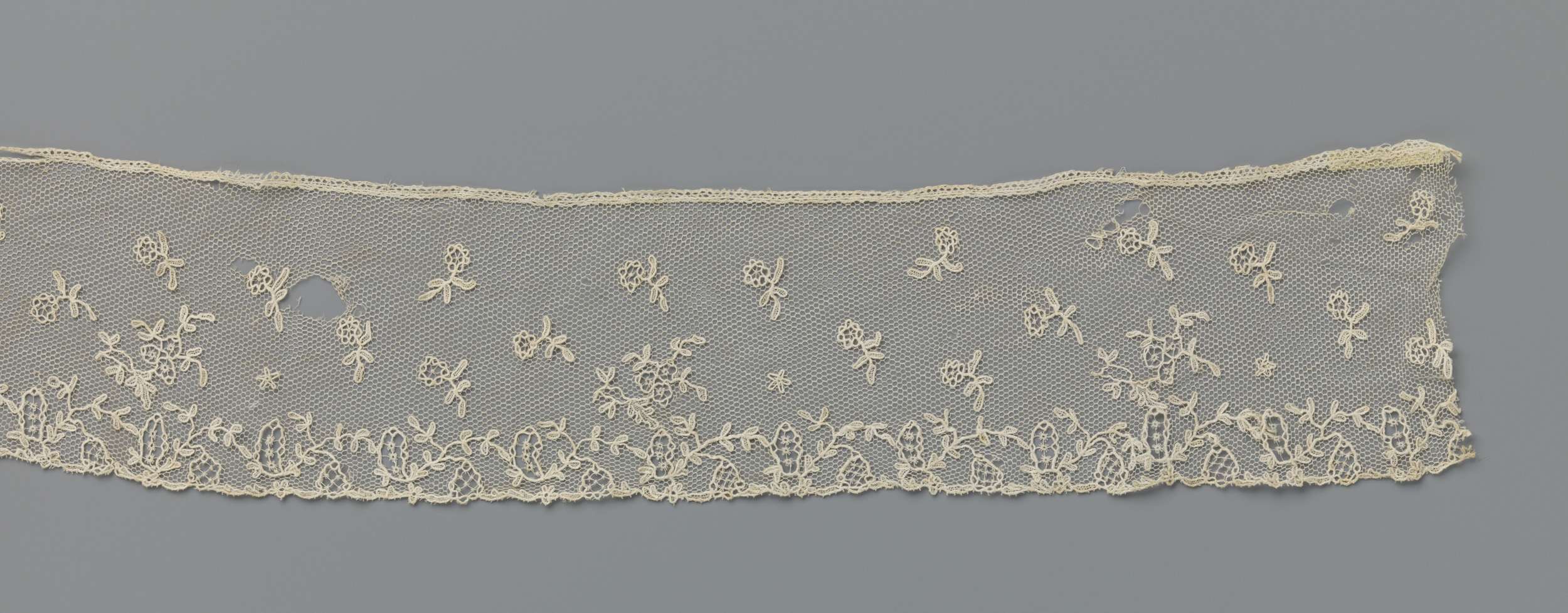 Lace artwork featuring flowers by Unknown Artist