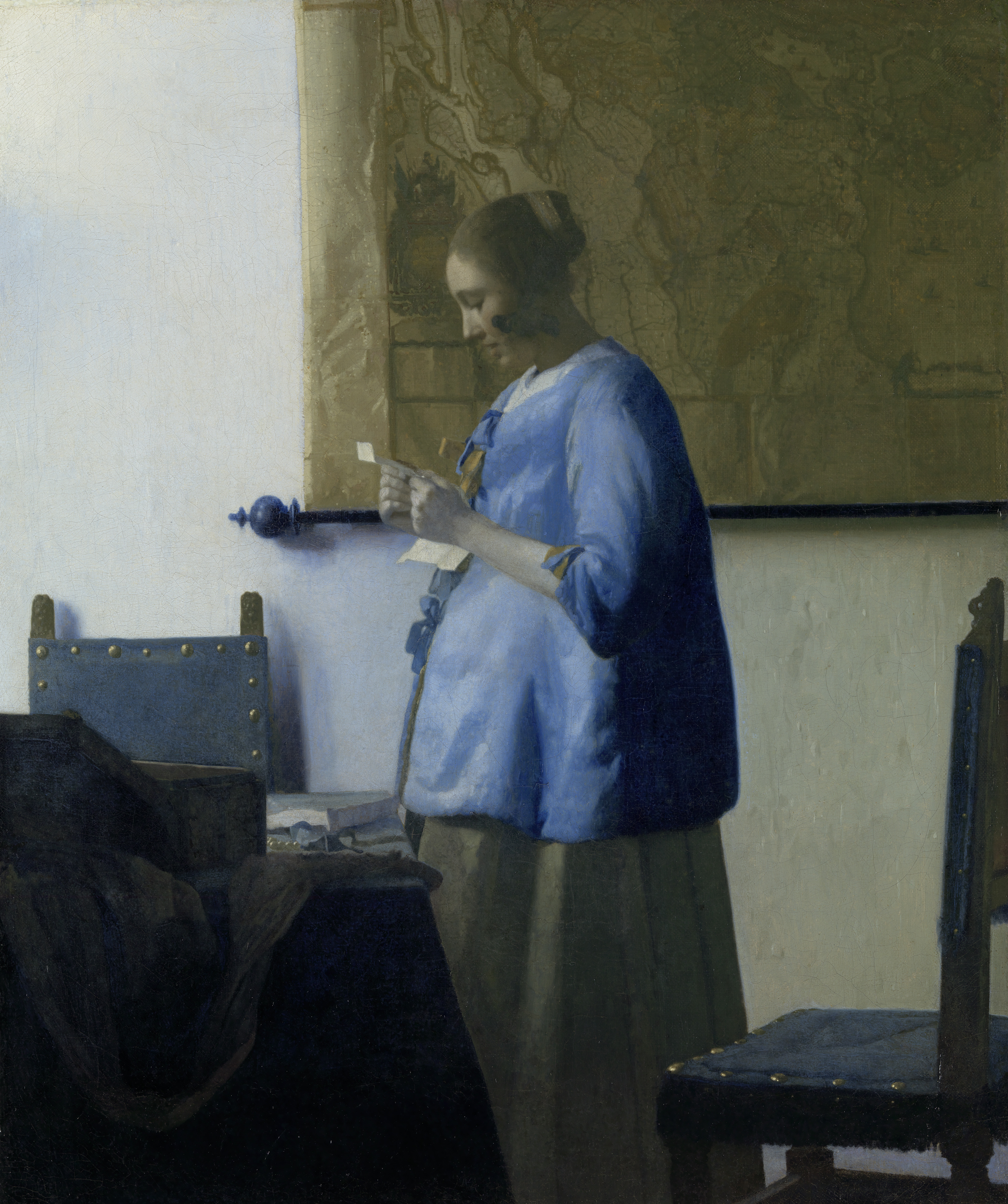 Woman Reading a Letter, by Johannes Vermeer, public domain