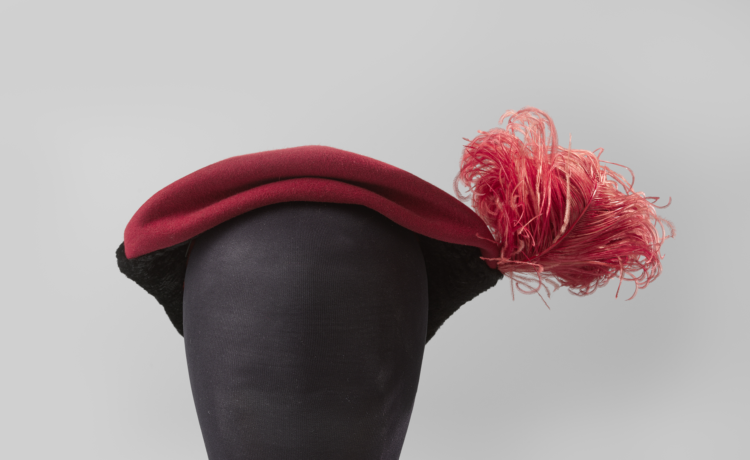 Hat made of red fabric and black velvet by Hut Laco, Modernism