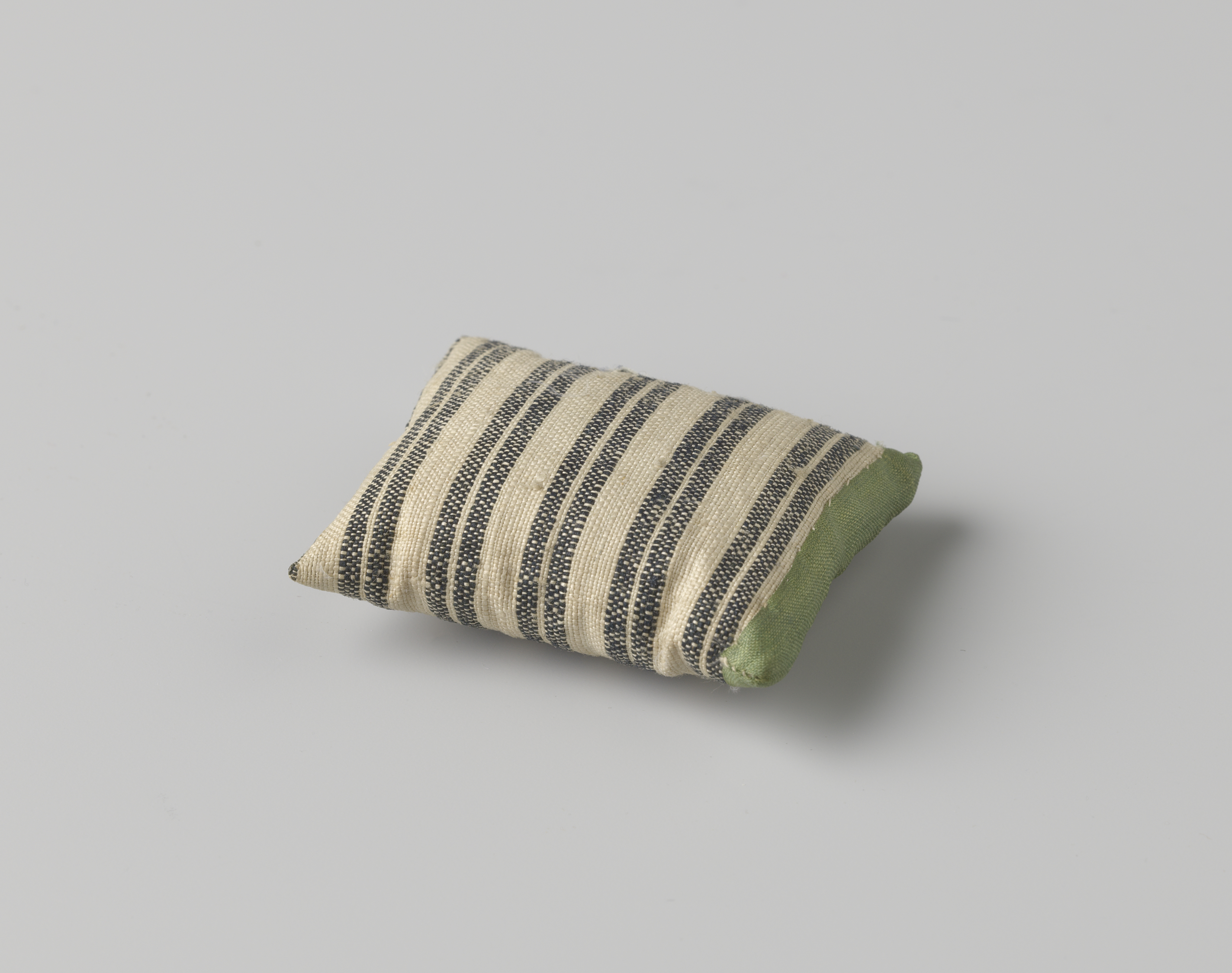 Decorative linen cushion with blue and white stripes by Unknown Artist