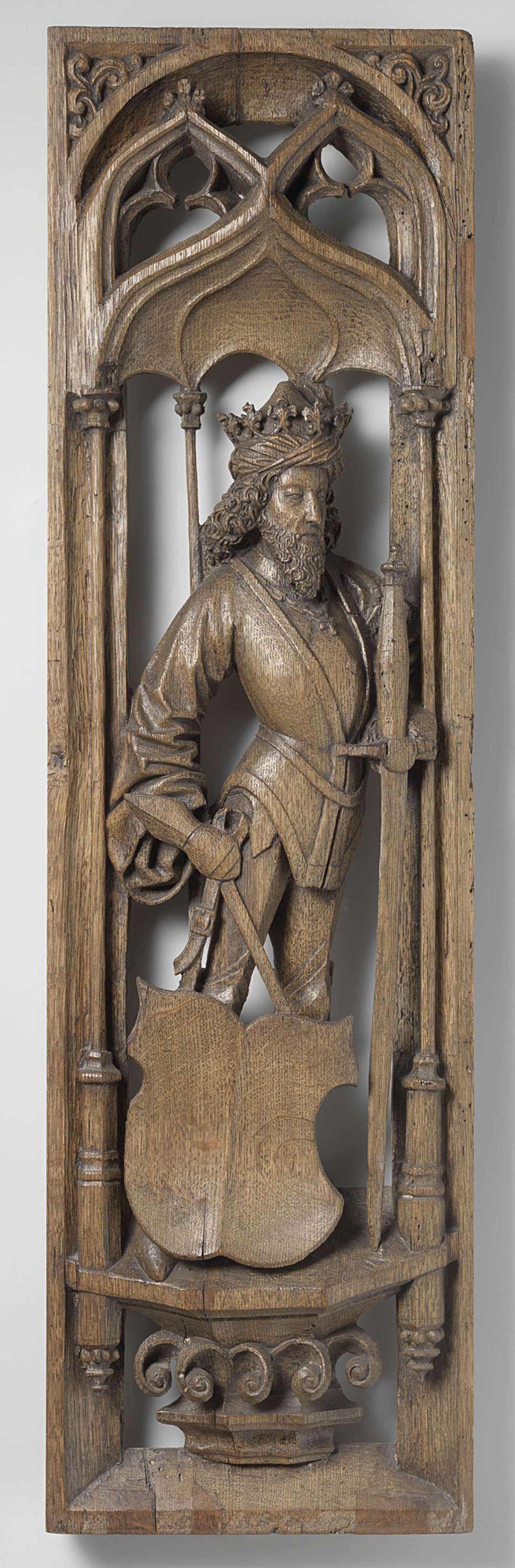 Panels from an organ case in oak by Jan Eerstensz van Schayck depicting figures with weapons.