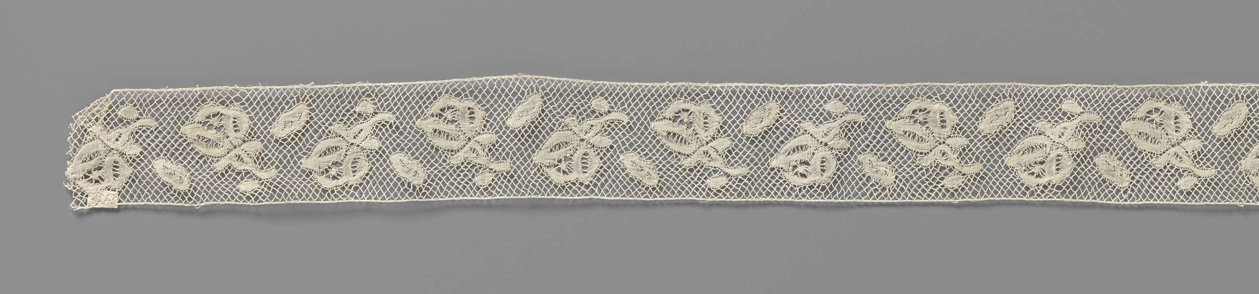 Lace artwork featuring roses by Unknown Artist