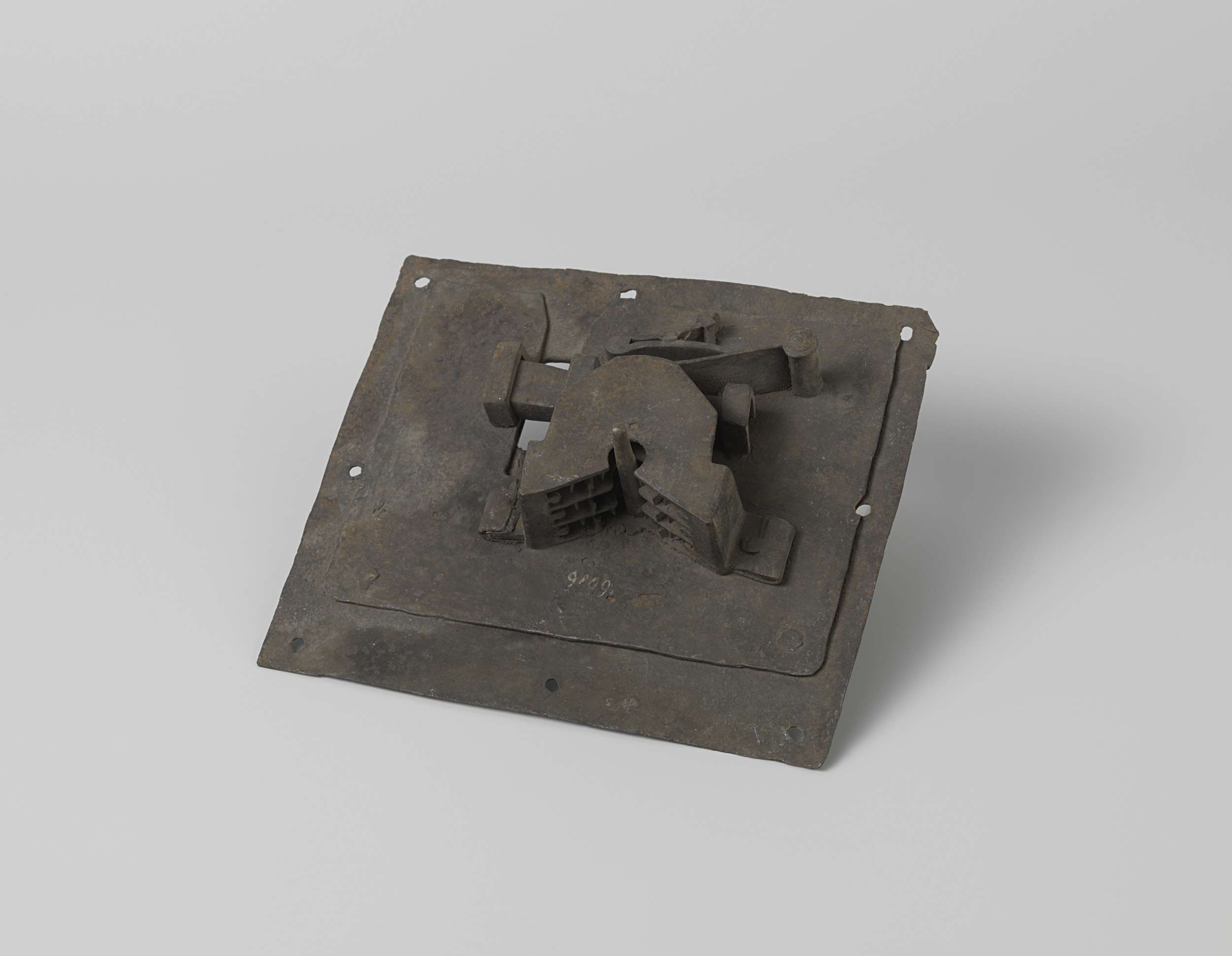 Intricate metalwork titled 'Slot' by anoniem