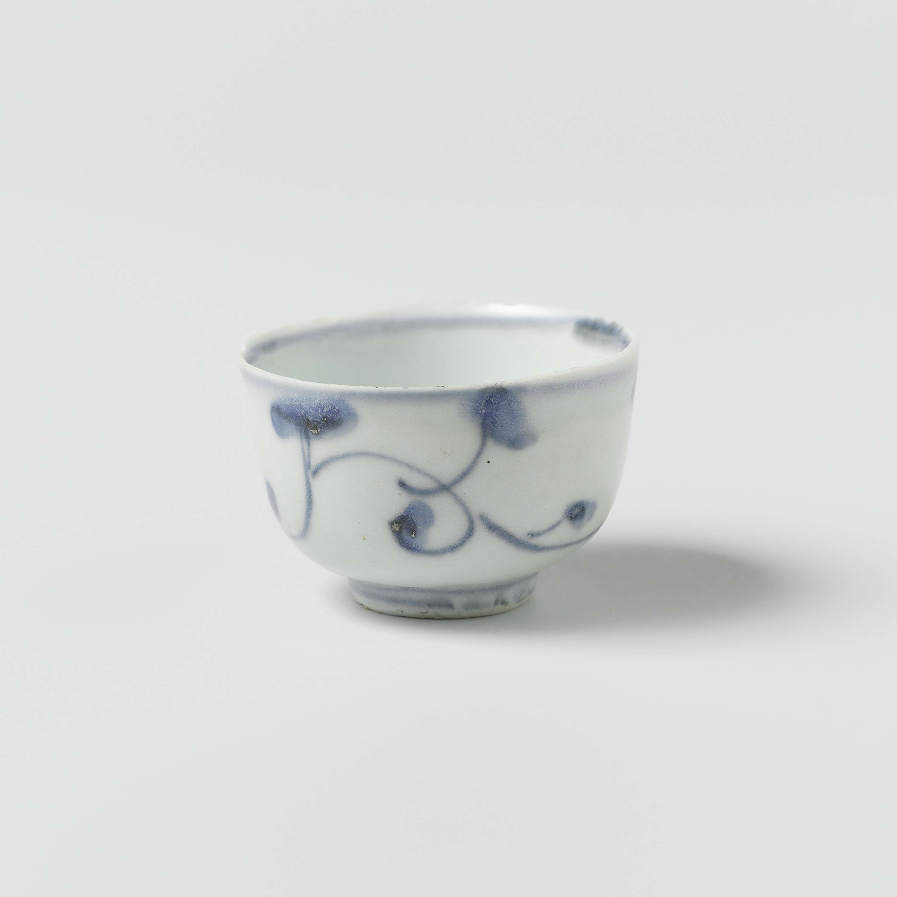 Porcelain wine goblet by Unknown Artist with intricate gold designs