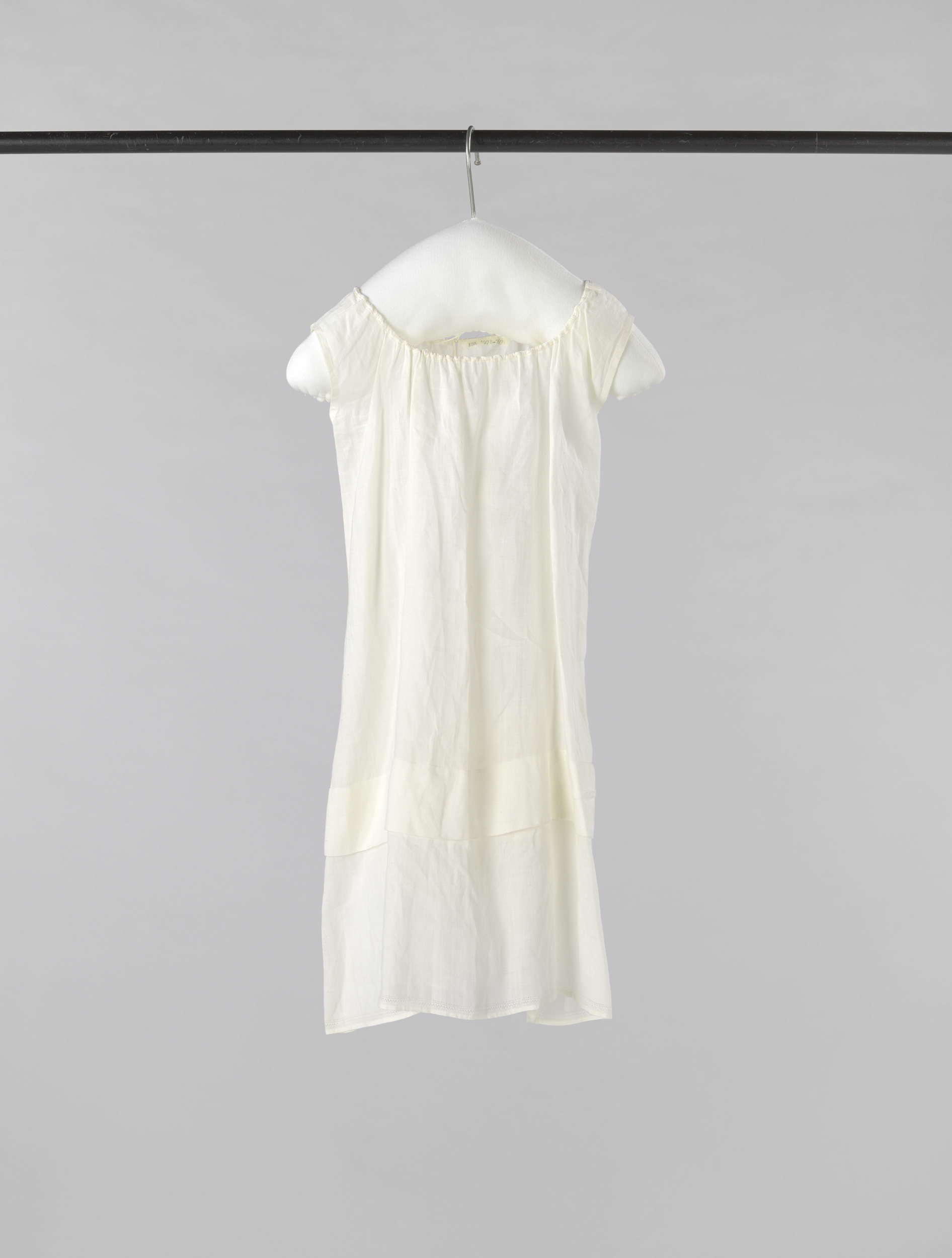 Linen baby shirt with open hems, unknown artist