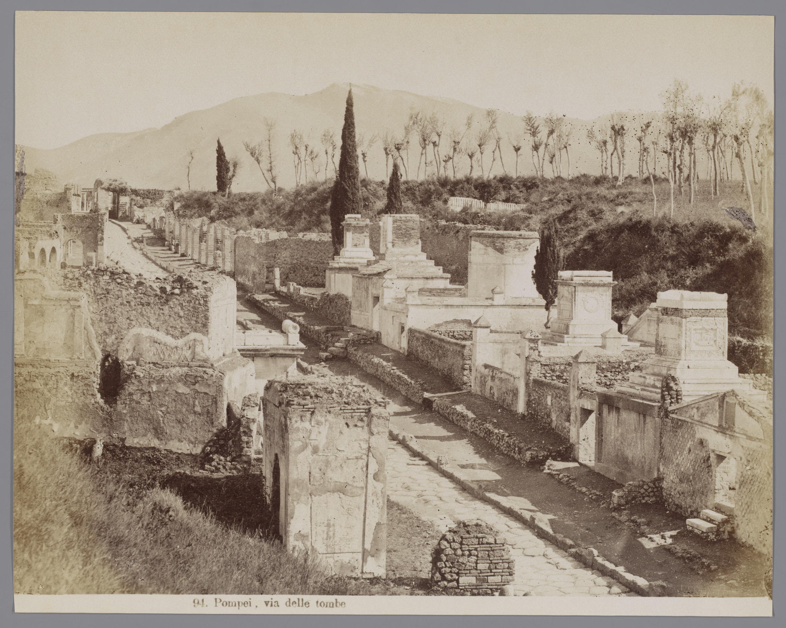 Albumen print of Via delle Tombe in Pompei with Vesuvius, unknown artist