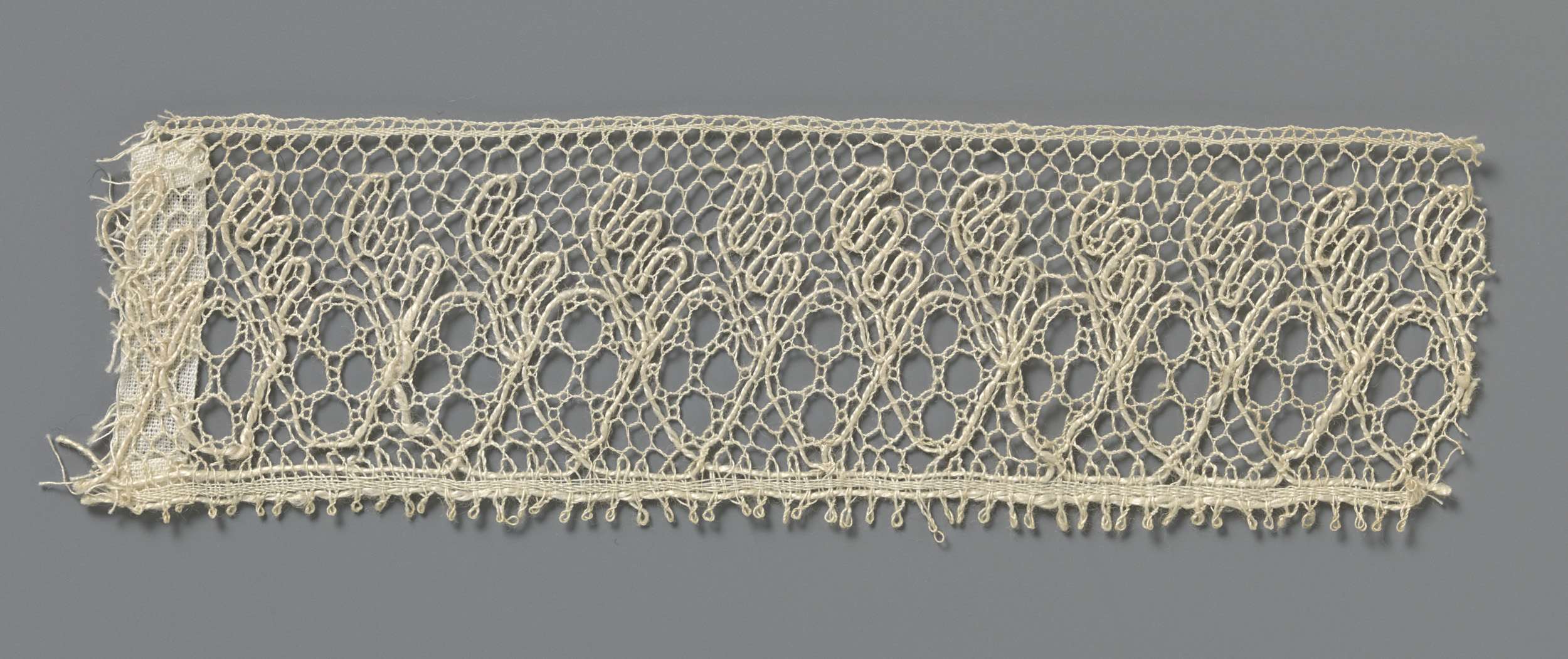 Lace decorative art by Unknown Artist, featuring intricate patterns and ovals.