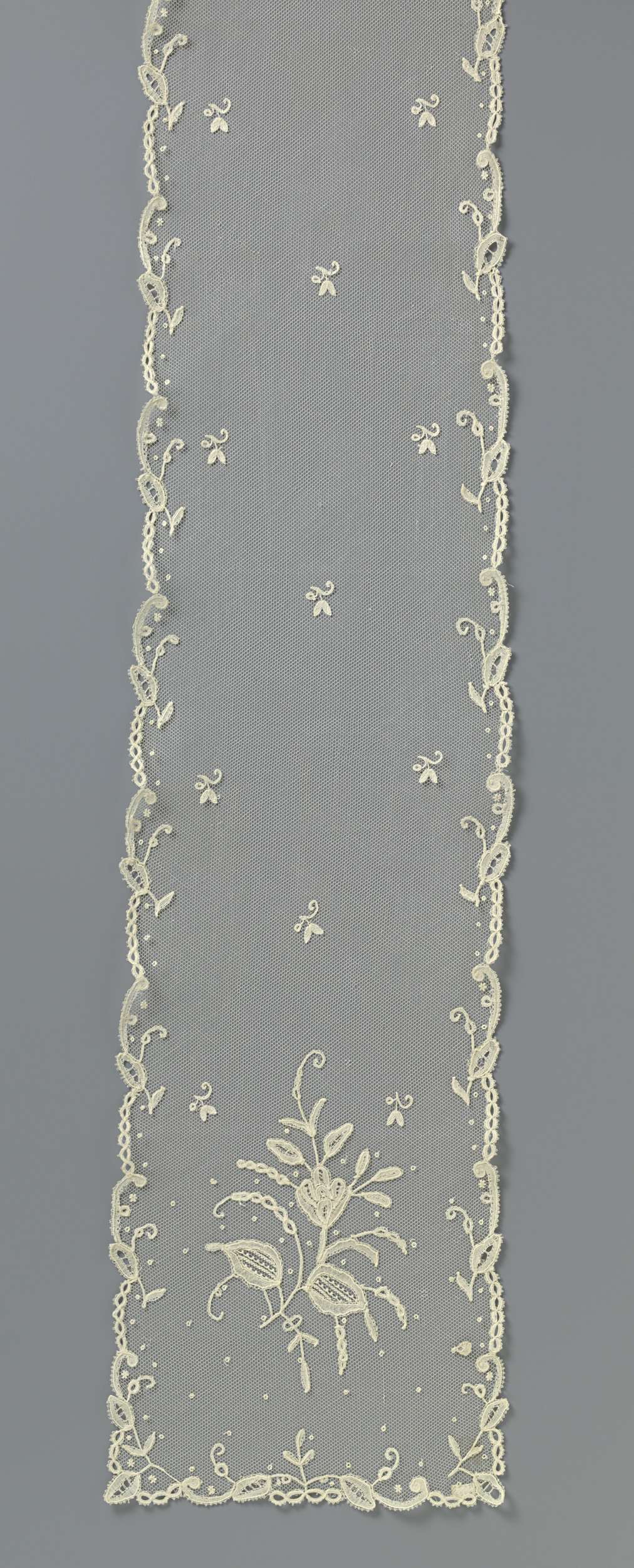 Lace textile piece featuring floral motifs by Unknown Artist