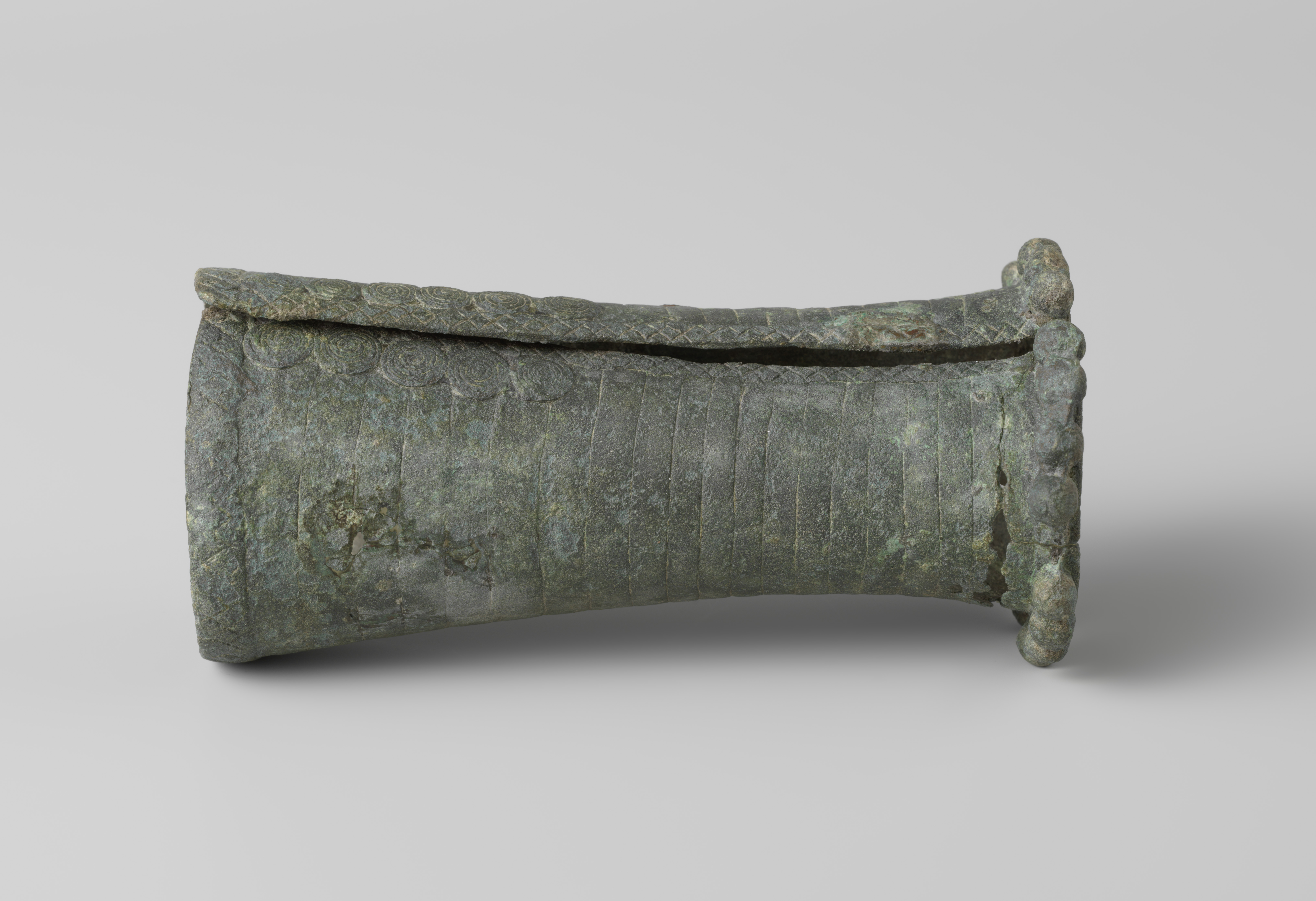 Ancient bronze armband with intricate patterns by an unknown artist