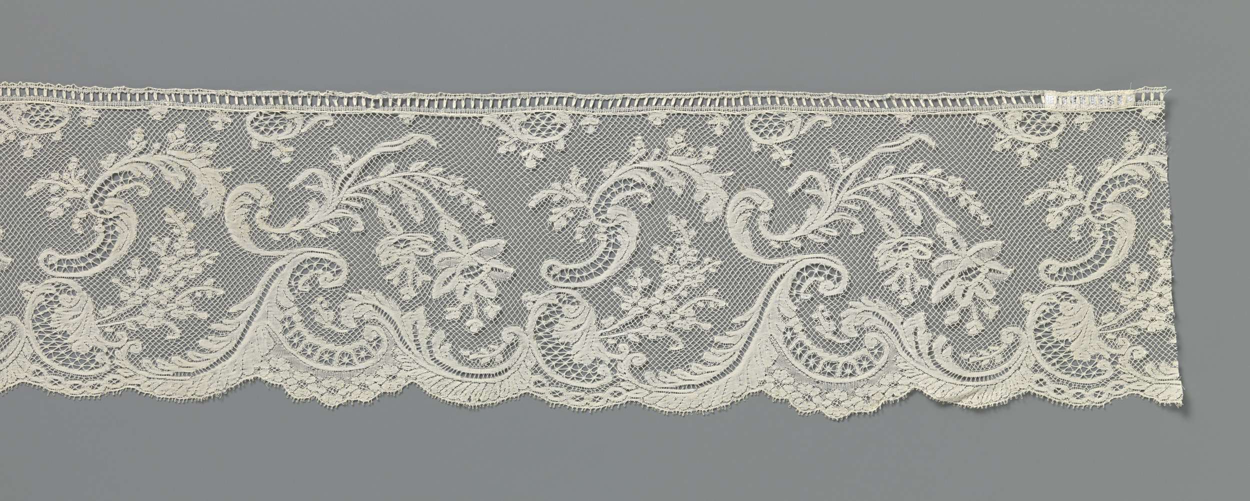 Lace artwork by Unknown Artist featuring fuchsias and swirling waves, c. 1890