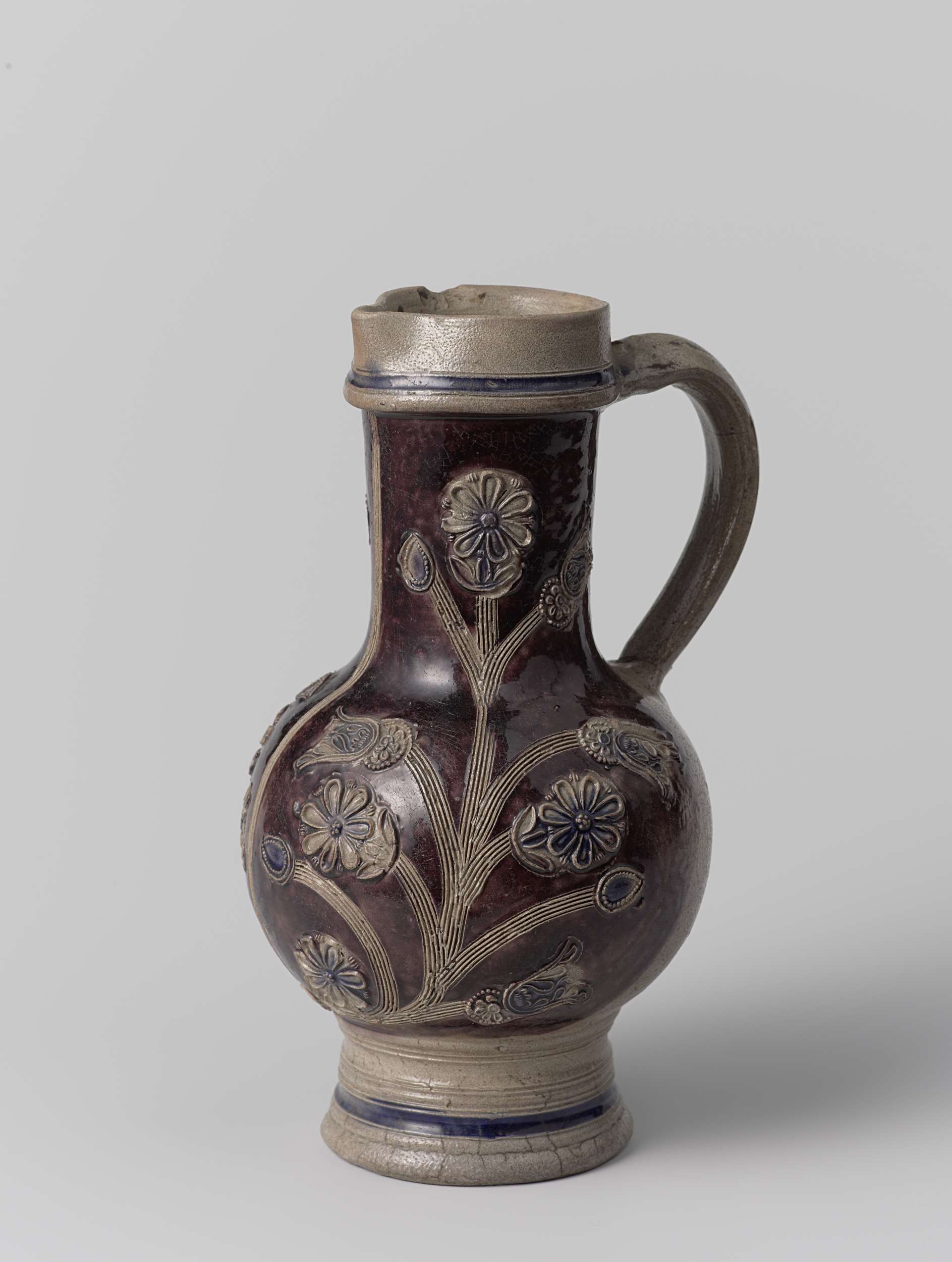 Ceramic jug with floral scrolls by unknown artist