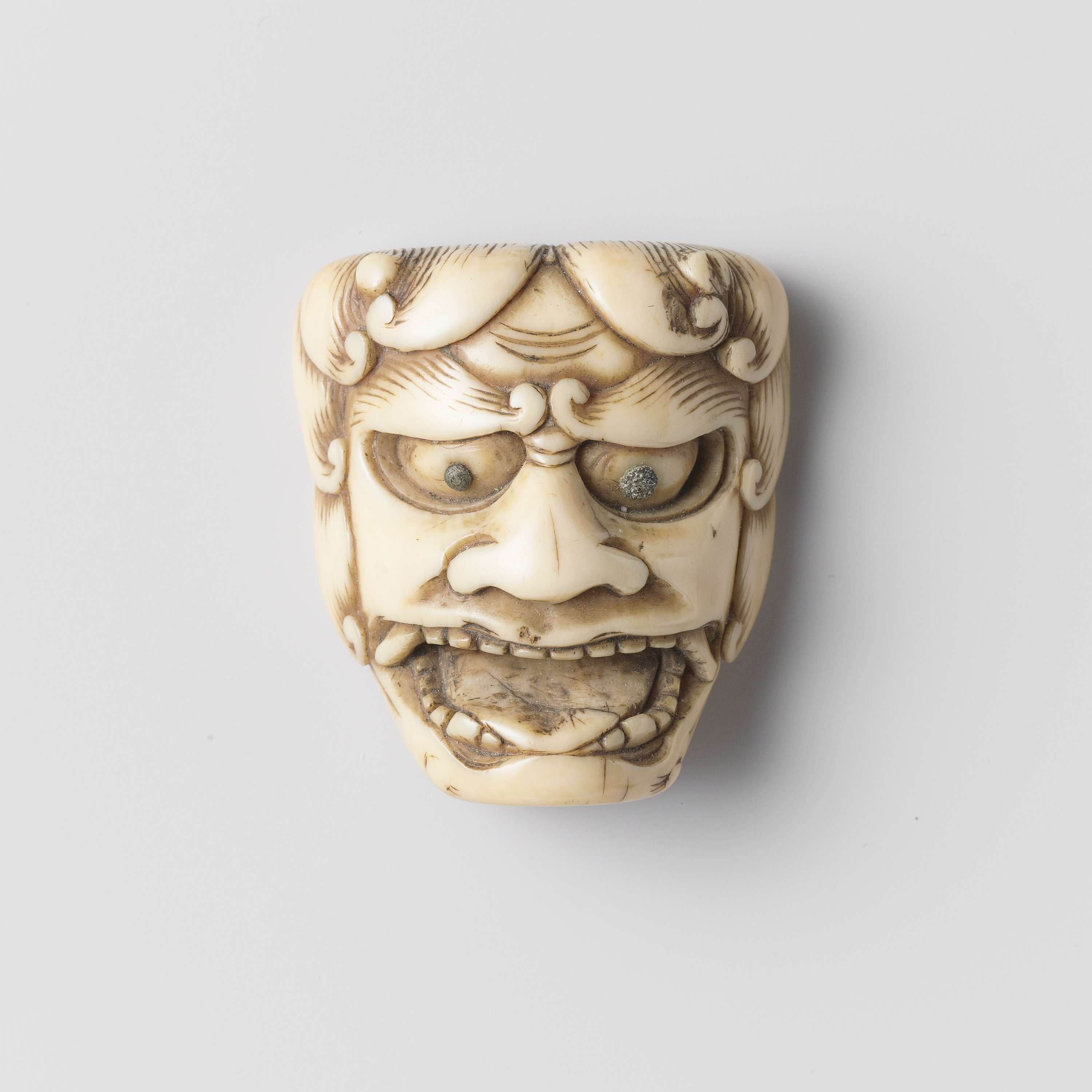 Netsuke figurine carved from ivory by an unknown artist