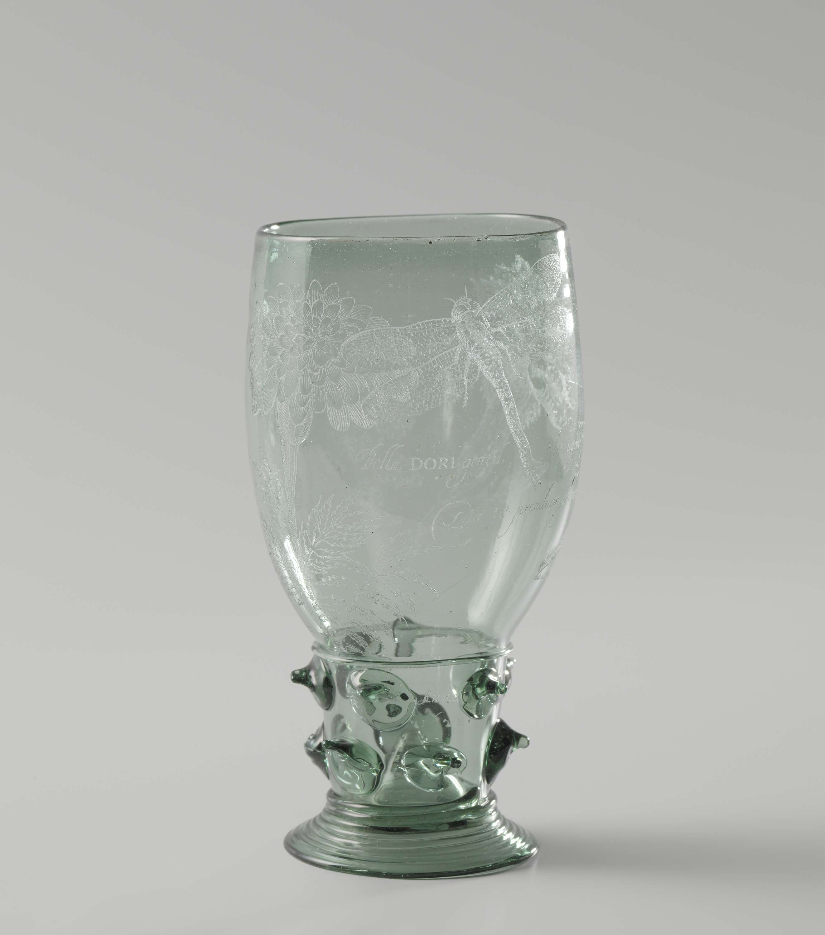 Engraving by Unknown Artist depicting flowers and a dragonfly on glass