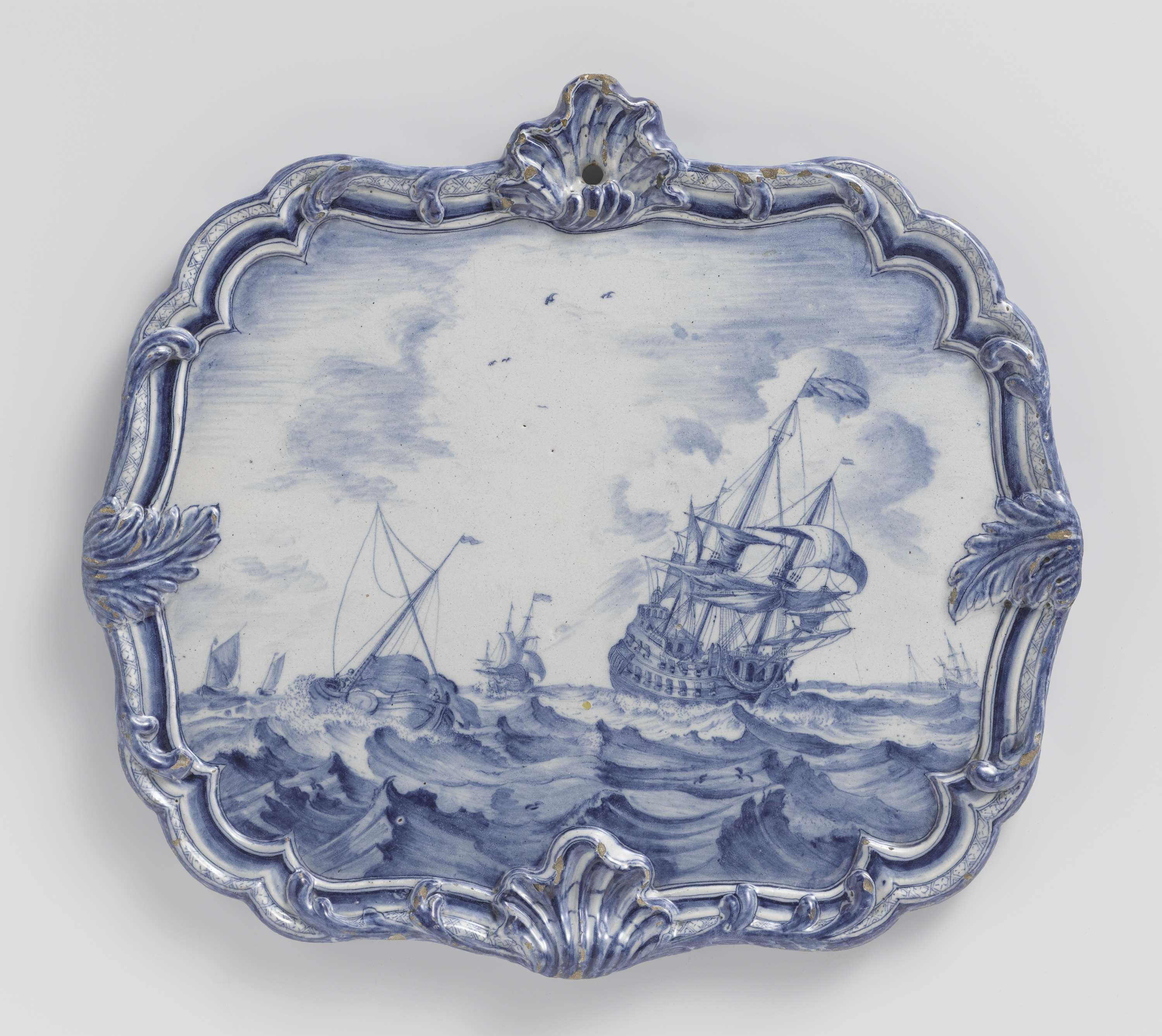 Ornate earthenware plaque by Unknown Artist, featuring vibrant colors and intricate details.