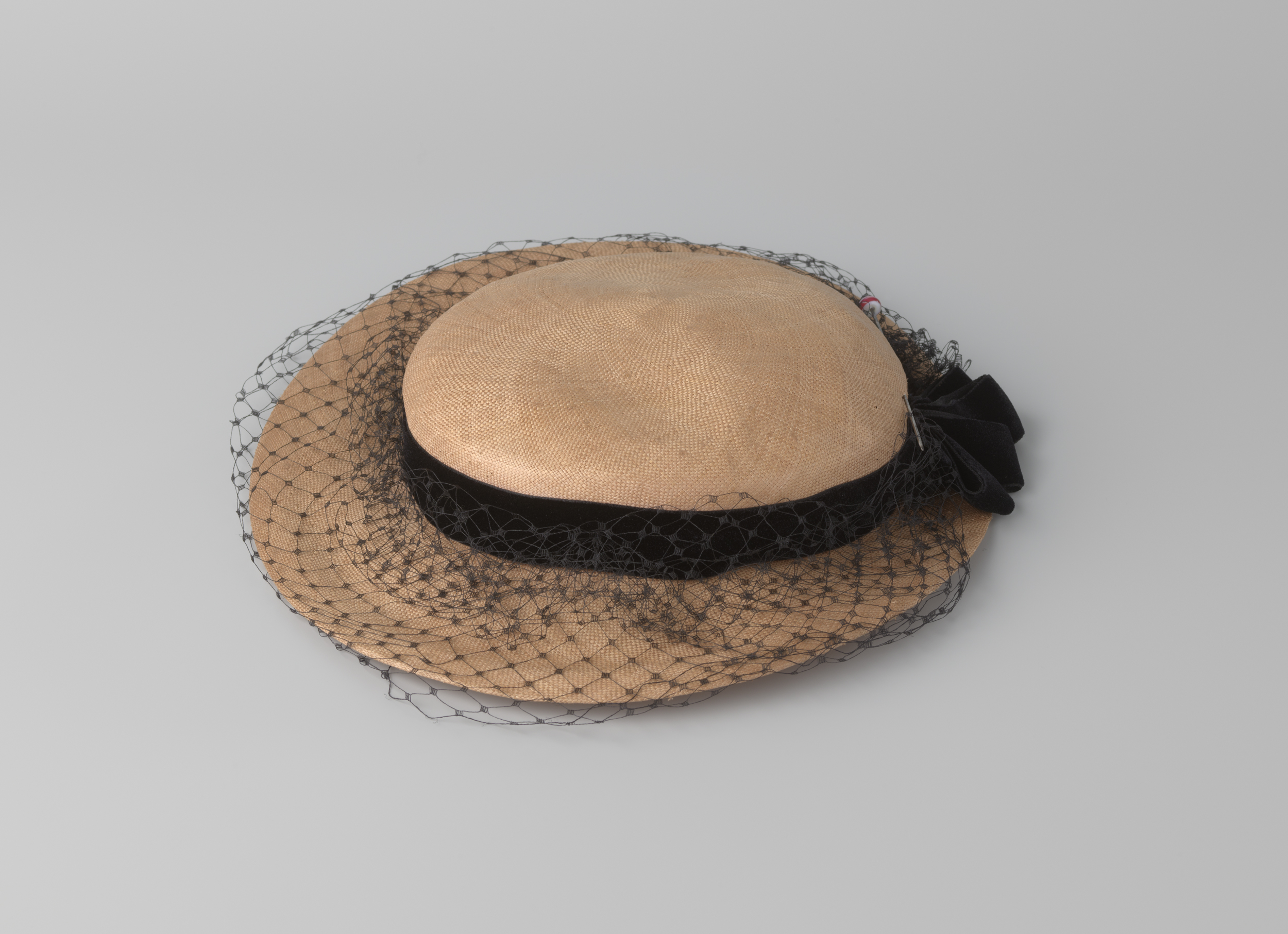 Decorative art hat made of velvet and straw by Unknown Artist