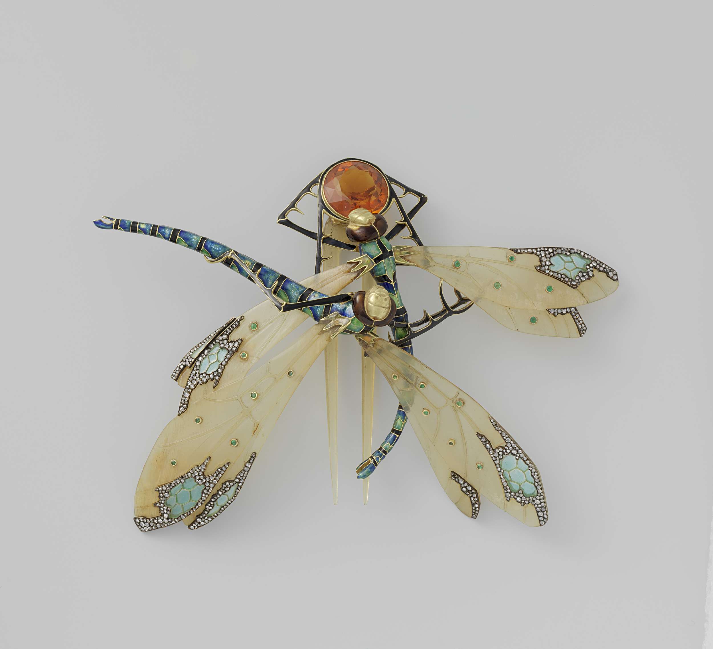 Comb shaped like two dragonflies, horn, by Lucien Gaillard