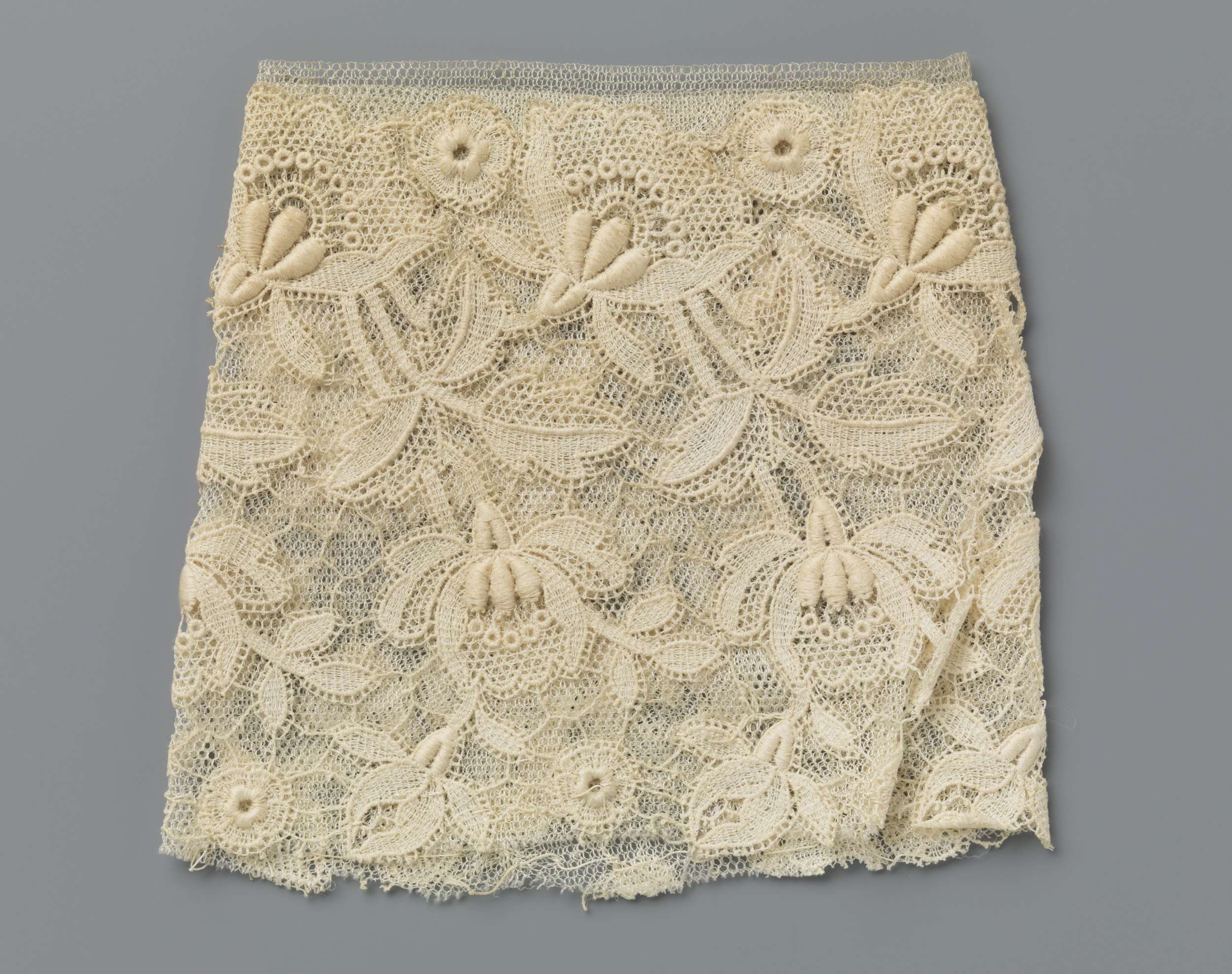 Lace textile art featuring fan-shaped flowers by Unknown Artist