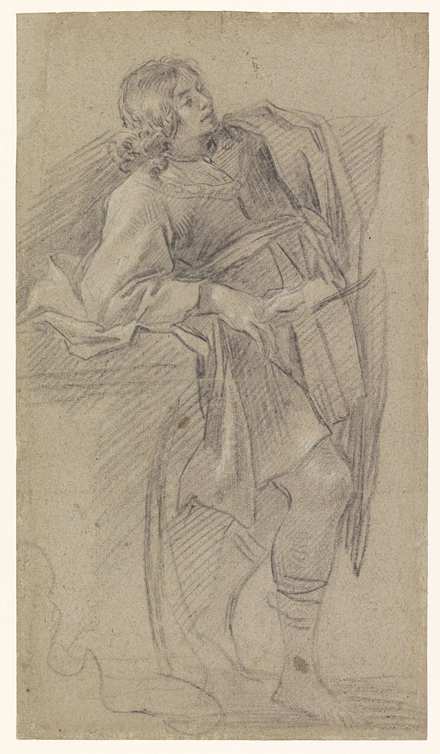 Drawing by Simon Vouet of a young man leaning against a table, paper