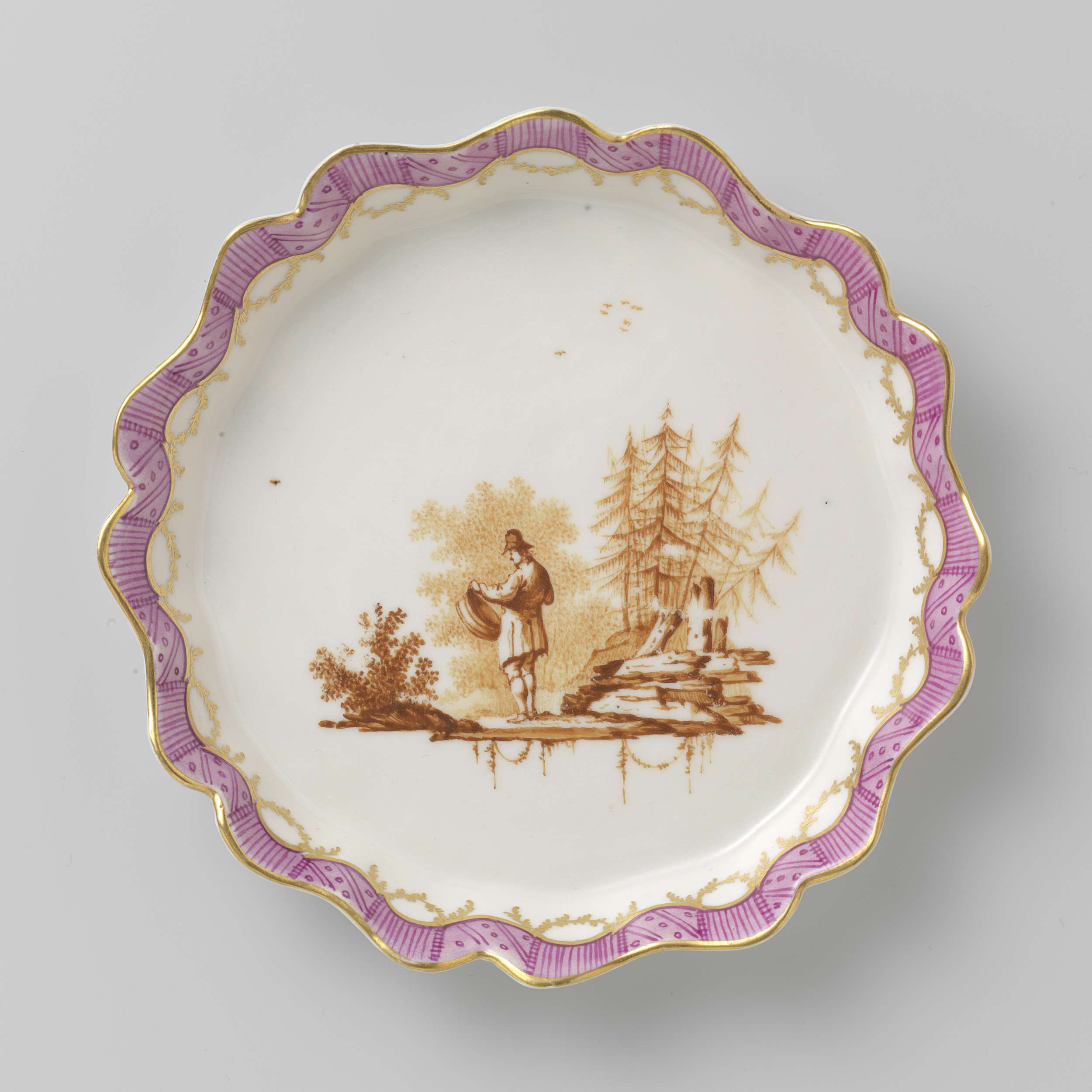 Porcelain tea service by Manufacture Oud-Loosdrecht, featuring a teapot, milk jug, and sugar bowl