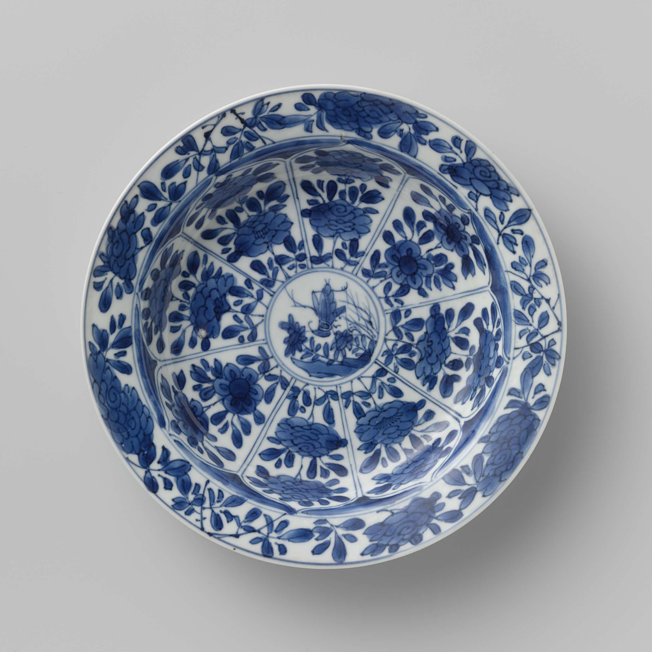 Ceramic saucer with floral designs by unknown artist