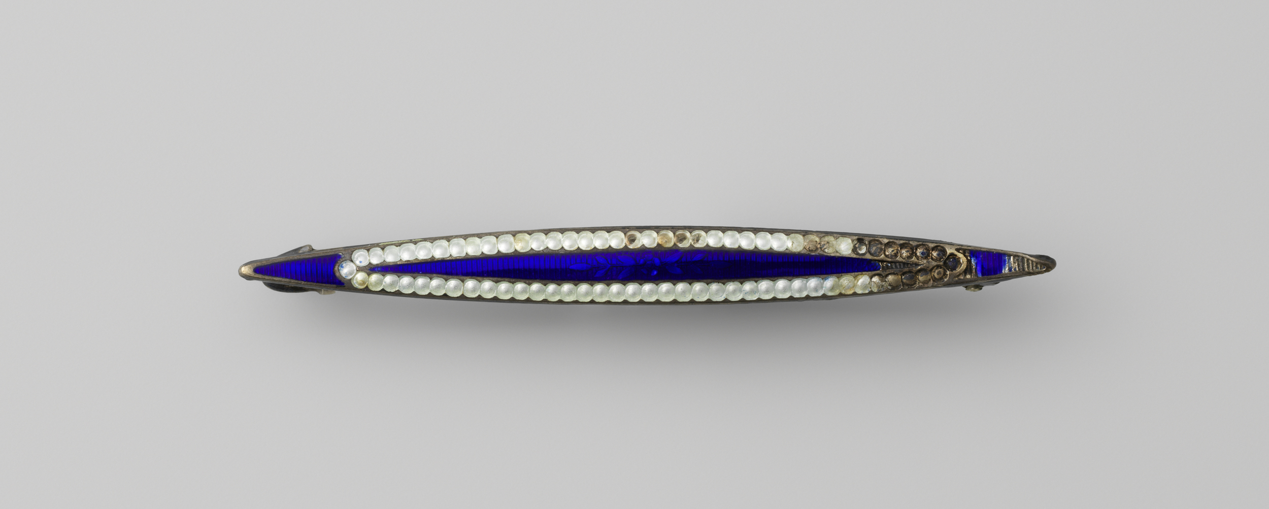 Victorian brooch made of metal with blue enamel and faux pearls by Joseph Adams & Son
