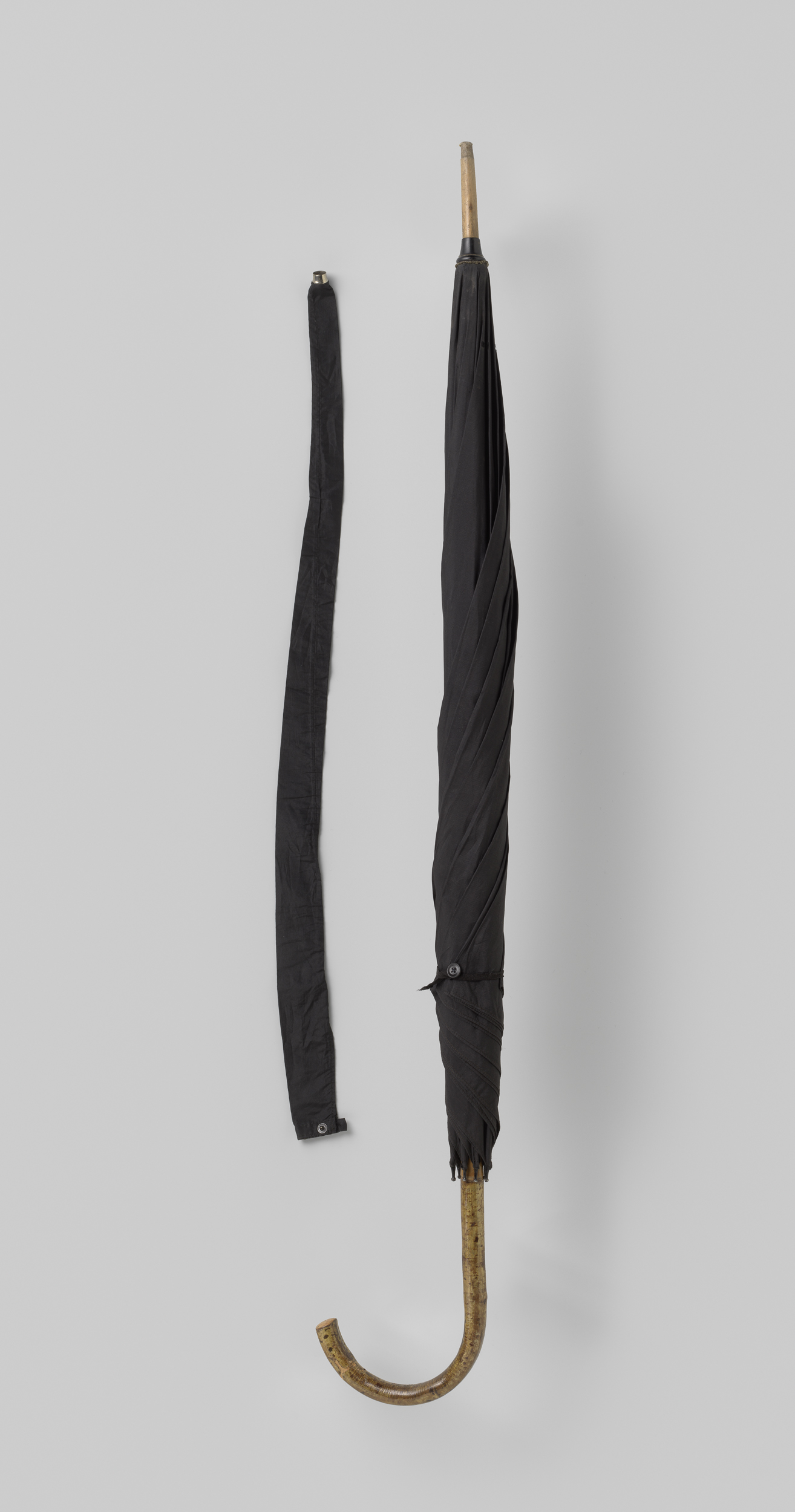 Decorative art featuring a black silk umbrella by Unknown Artist