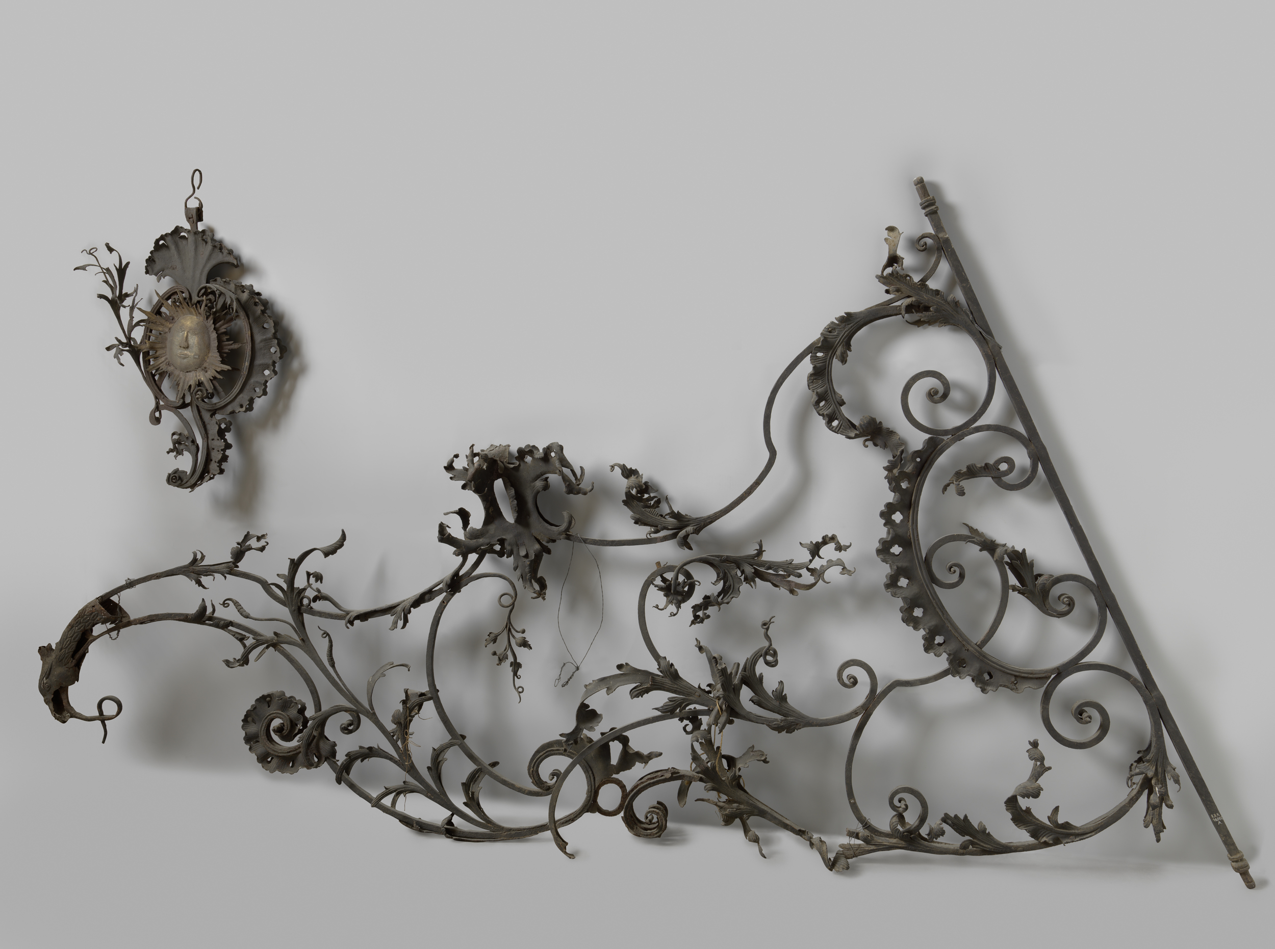 Decorative sign with ornate volutes resembling bird heads, unknown medium, unknown artist
