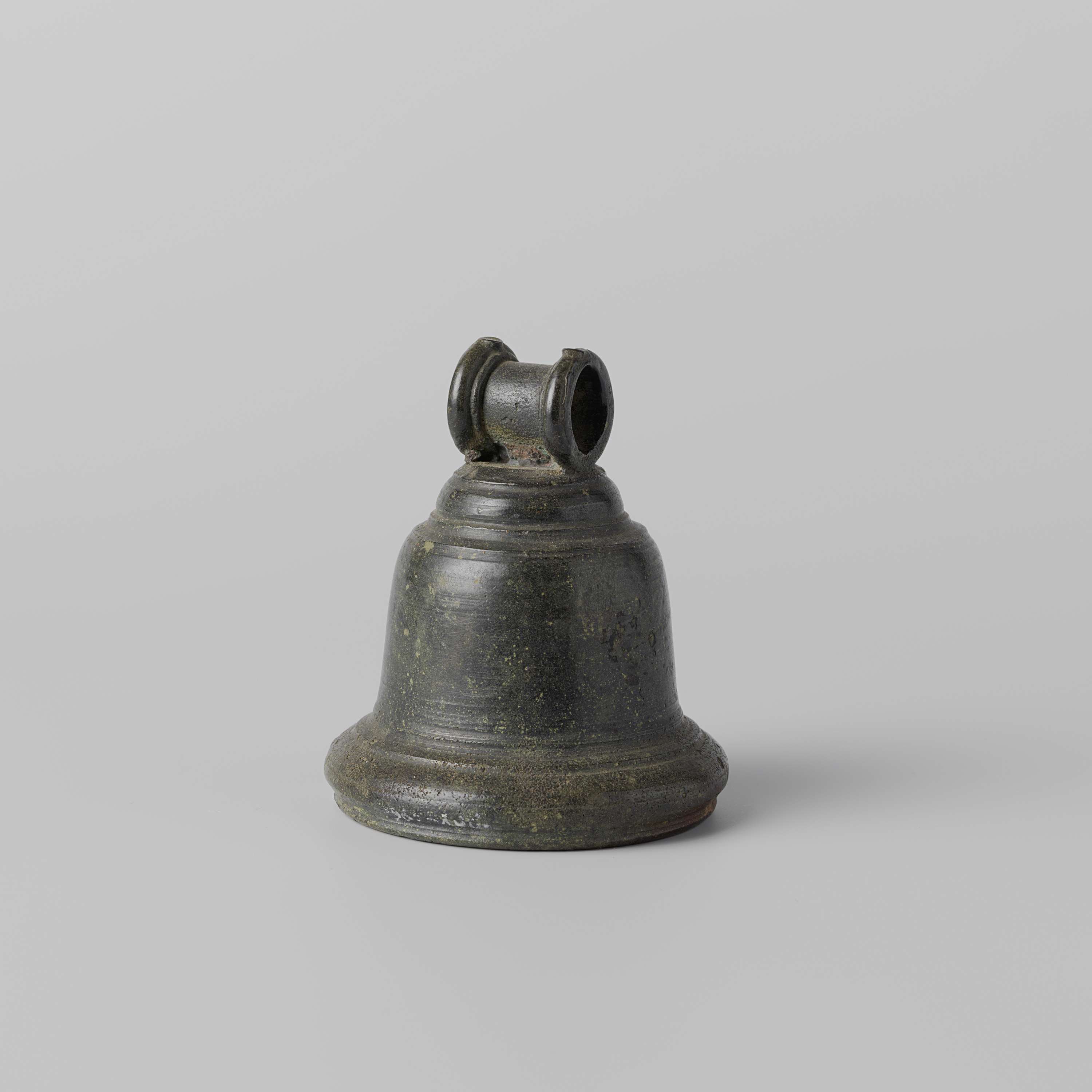 Bronze bell with intricate engravings by unknown artist