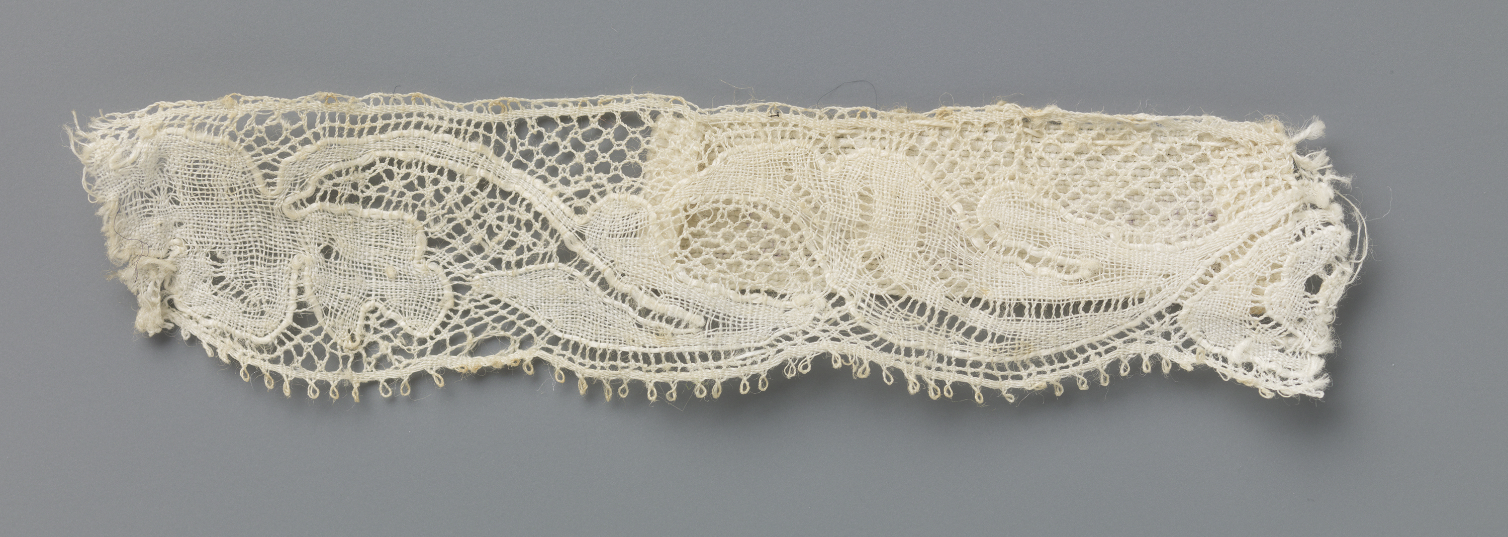 Lace textile featuring floral motifs by Unknown Artist