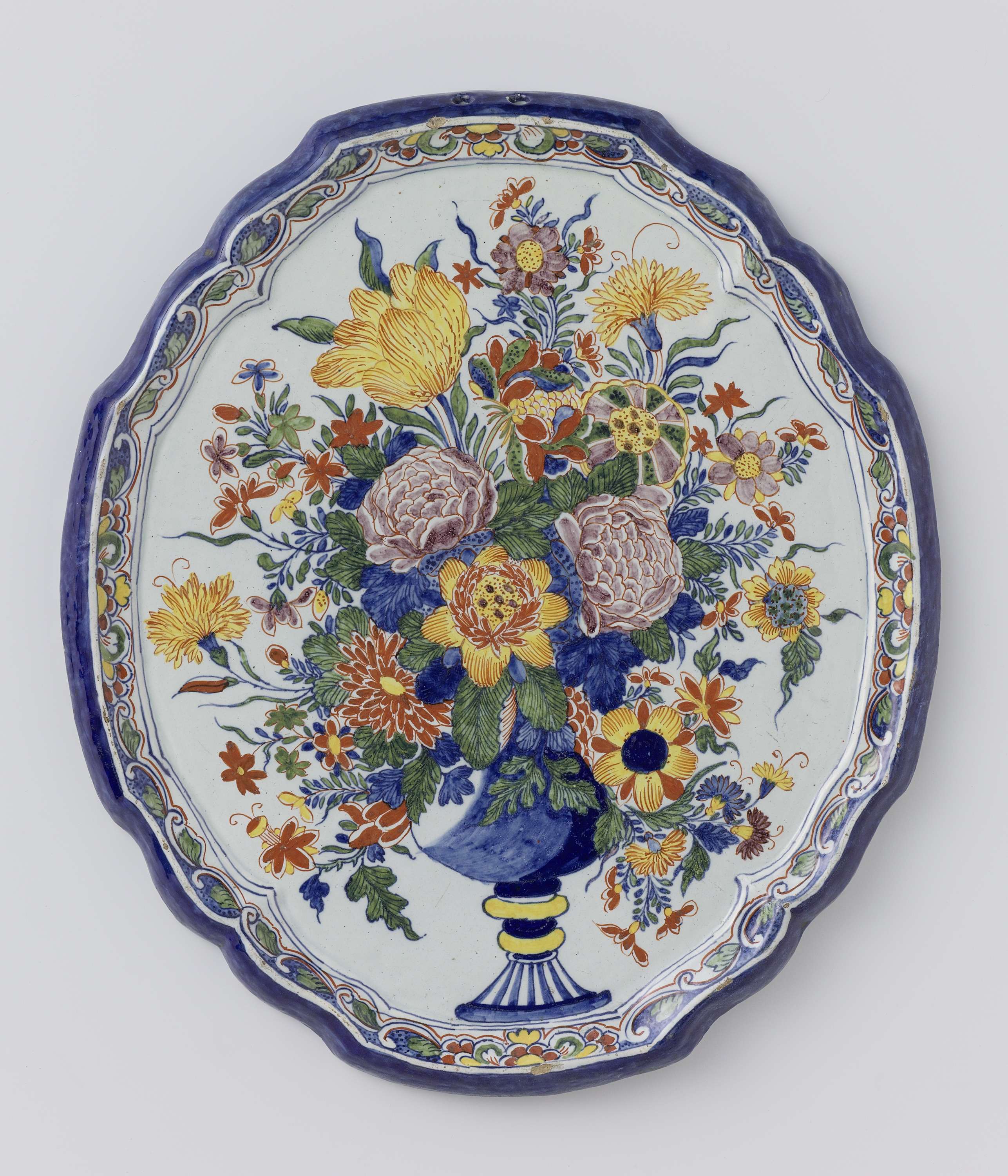 Ceramic still life with a colorful vase of flowers by Unknown Artist