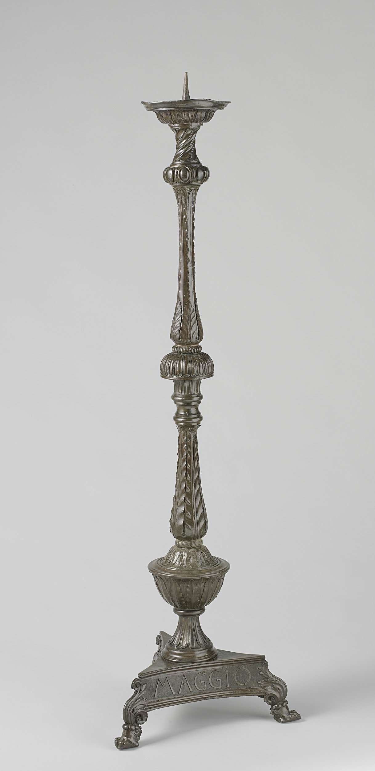 Bronze candlestick by Andrea del Verrocchio, intricately designed from 1468.