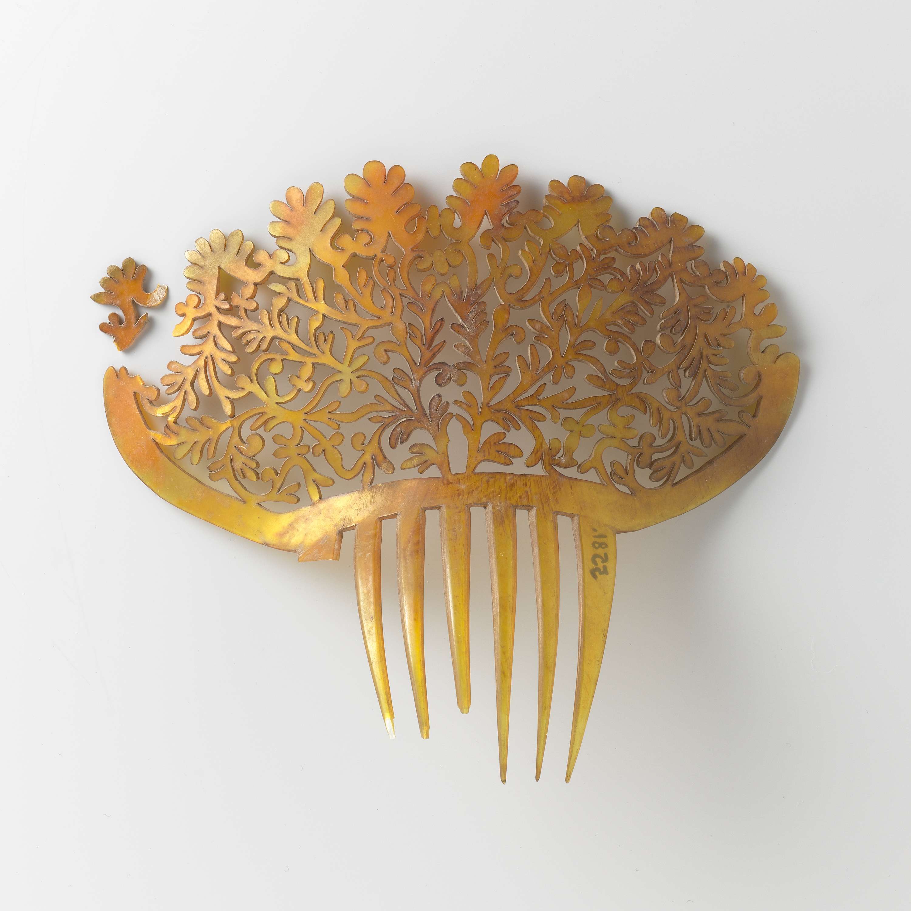 Decorative art comb made of horn and turtle shell by Unknown Artist