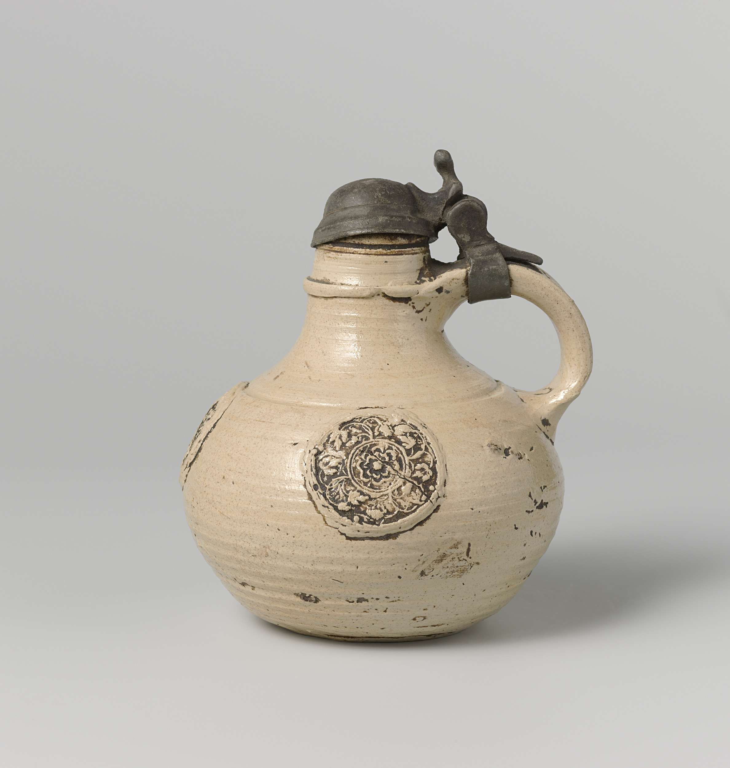Ceramic jug with three rosettes by Anno Knütgen