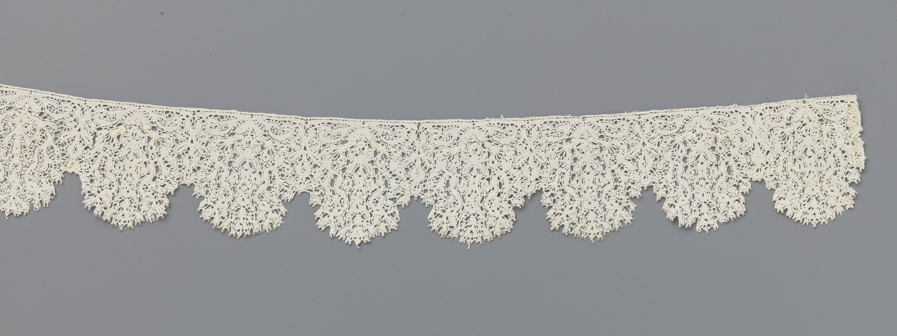 Lace textile featuring fine thistle flowers by Unknown Artist