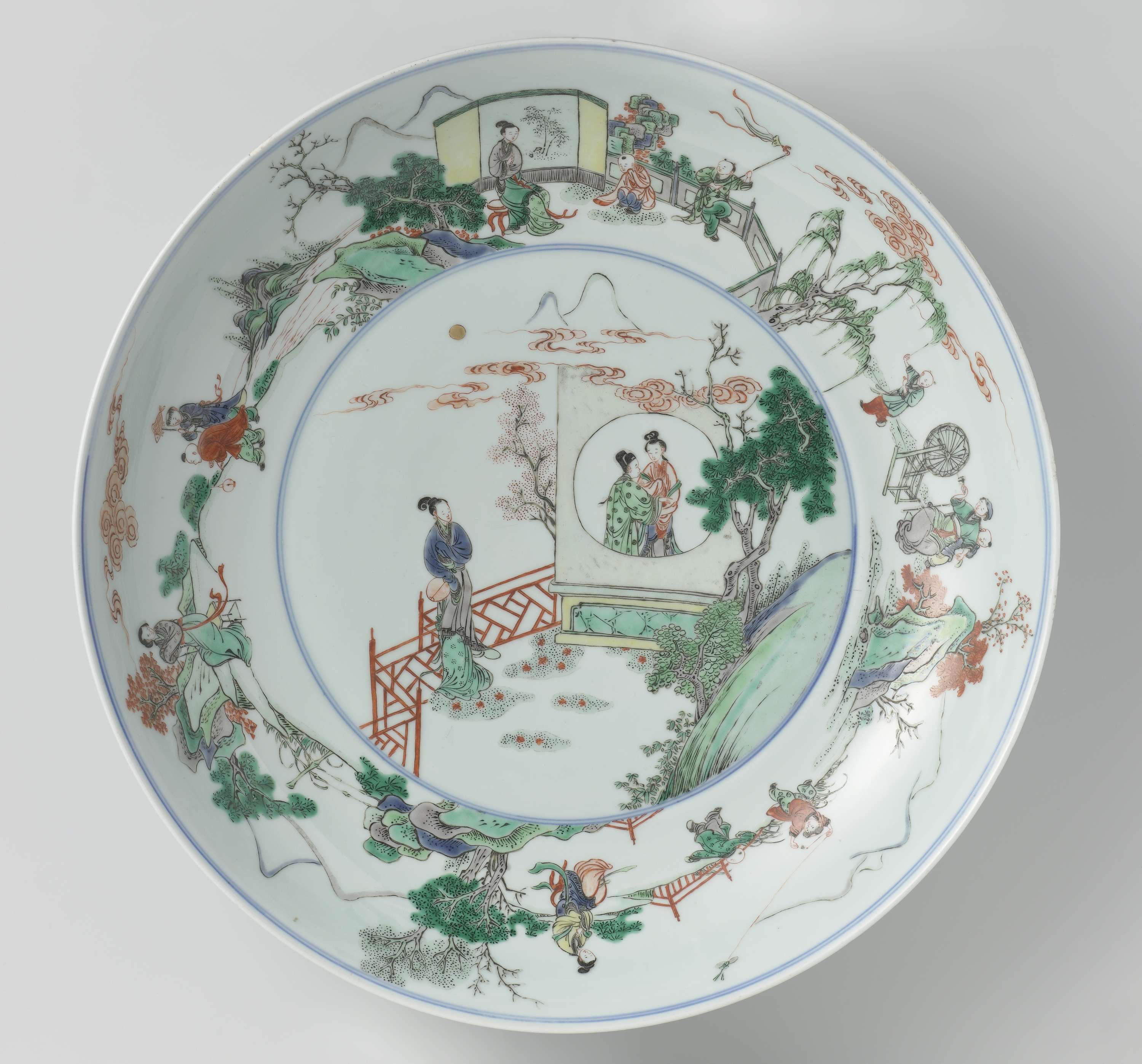 Genre scene depicting women and boys around a ceramic dish, Baroque style, unknown artist