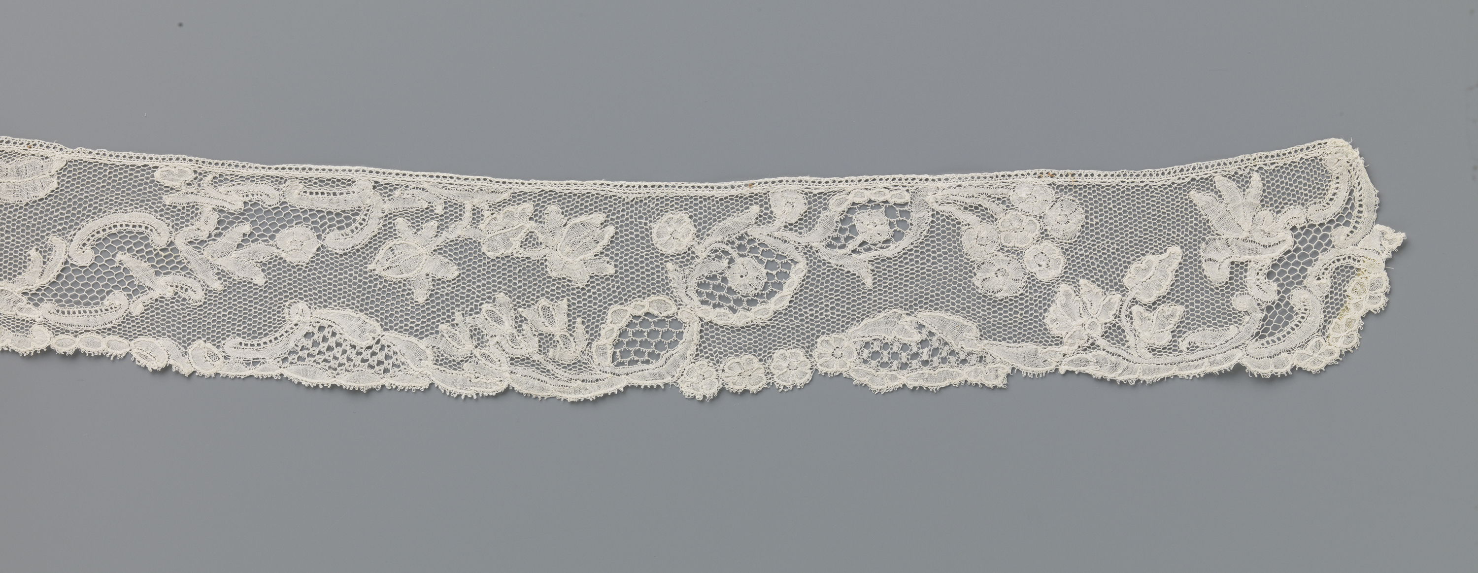 Lace textile featuring cartouches by Unknown Artist