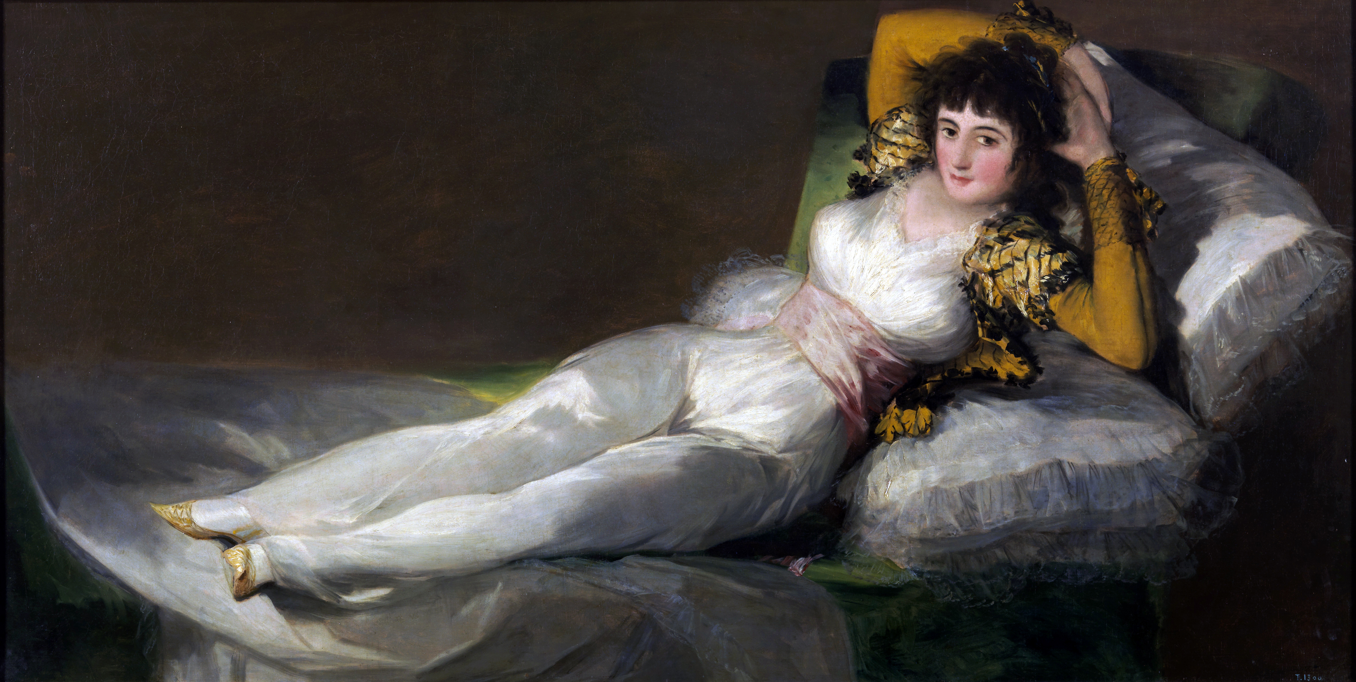 La maja vestida by Francisco de Goya, oil painting, shows a woman reclining in a white dress with a bolero.