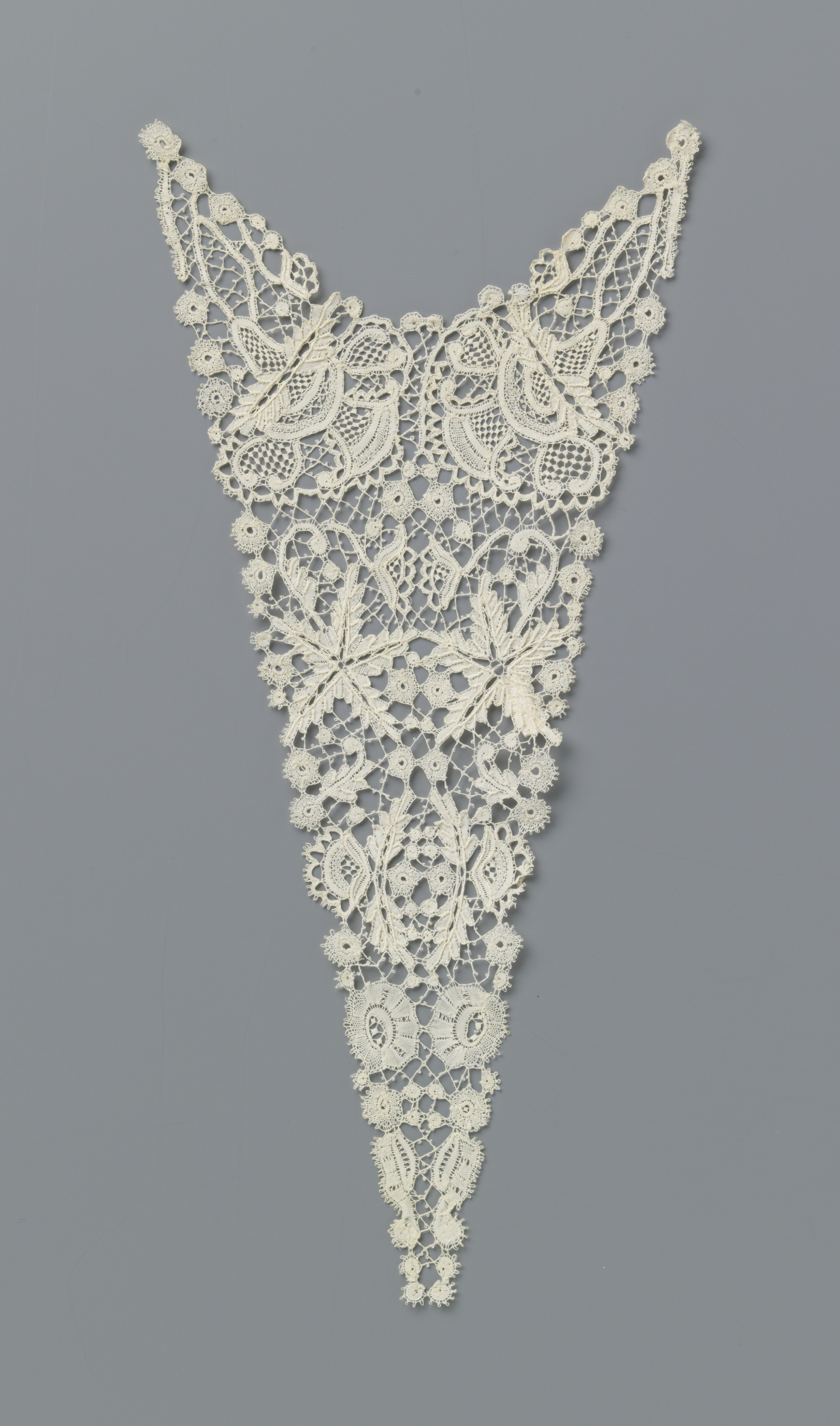 Lace vest featuring three-lobed fan flowers by Martha Berkers