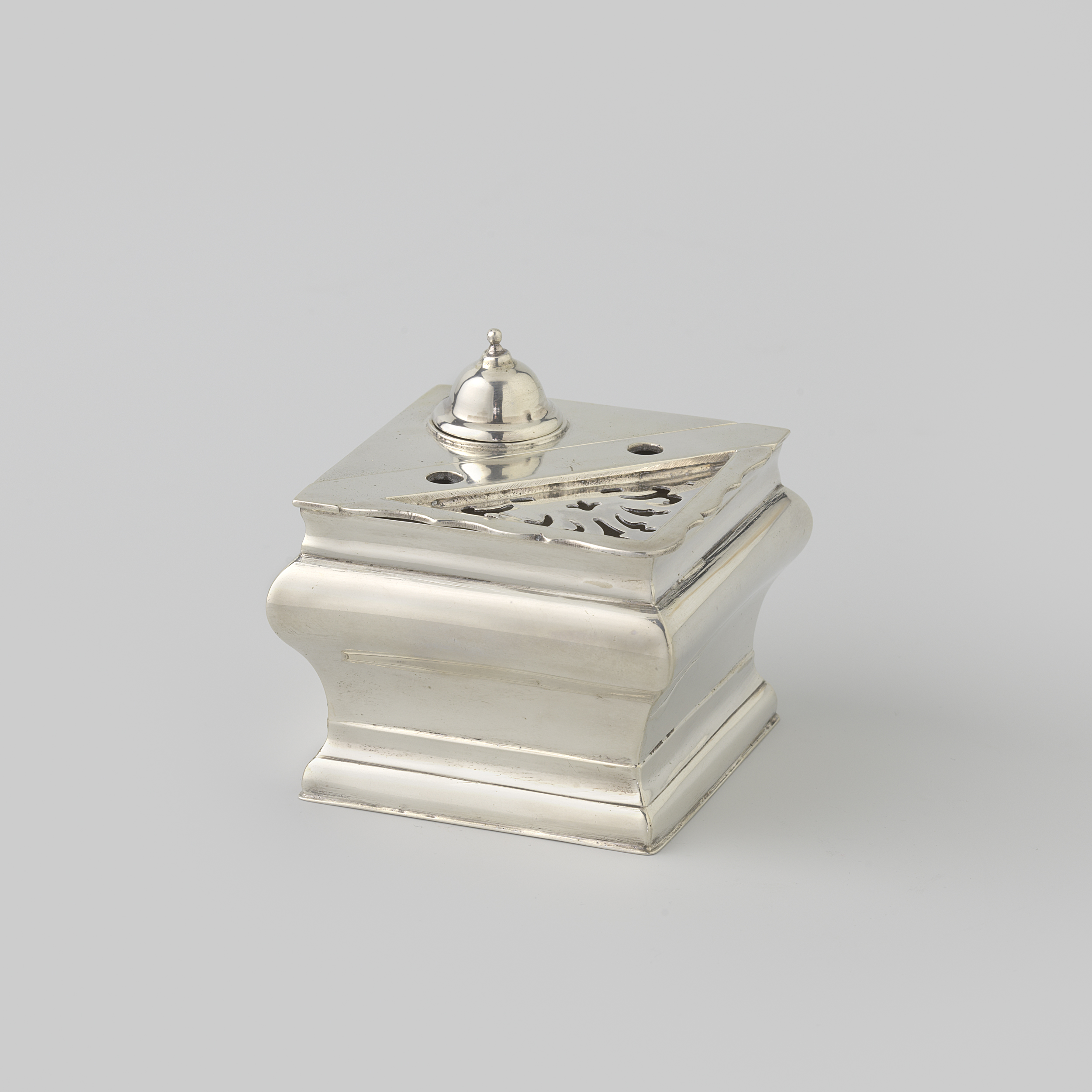 Metal inkstand by Reynier Brandt, featuring compartments for ink and sand.