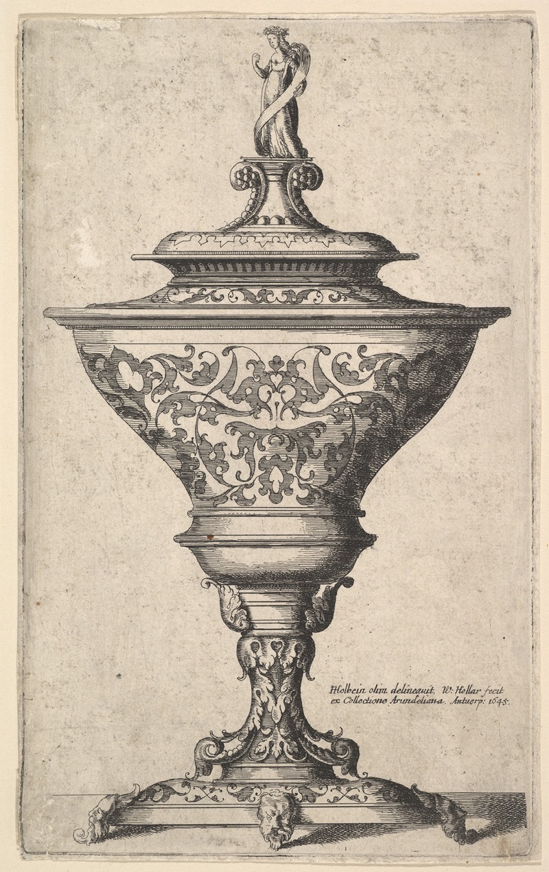 A striking etching of an ornate goblet supported by masks.