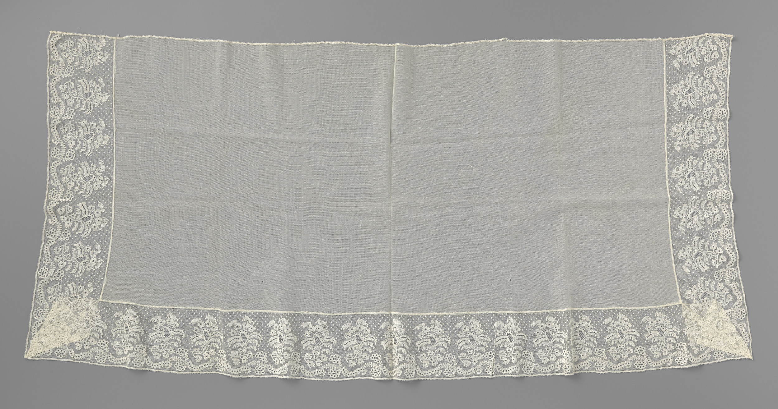 Lace work featuring intricate patterns by Unknown Artist