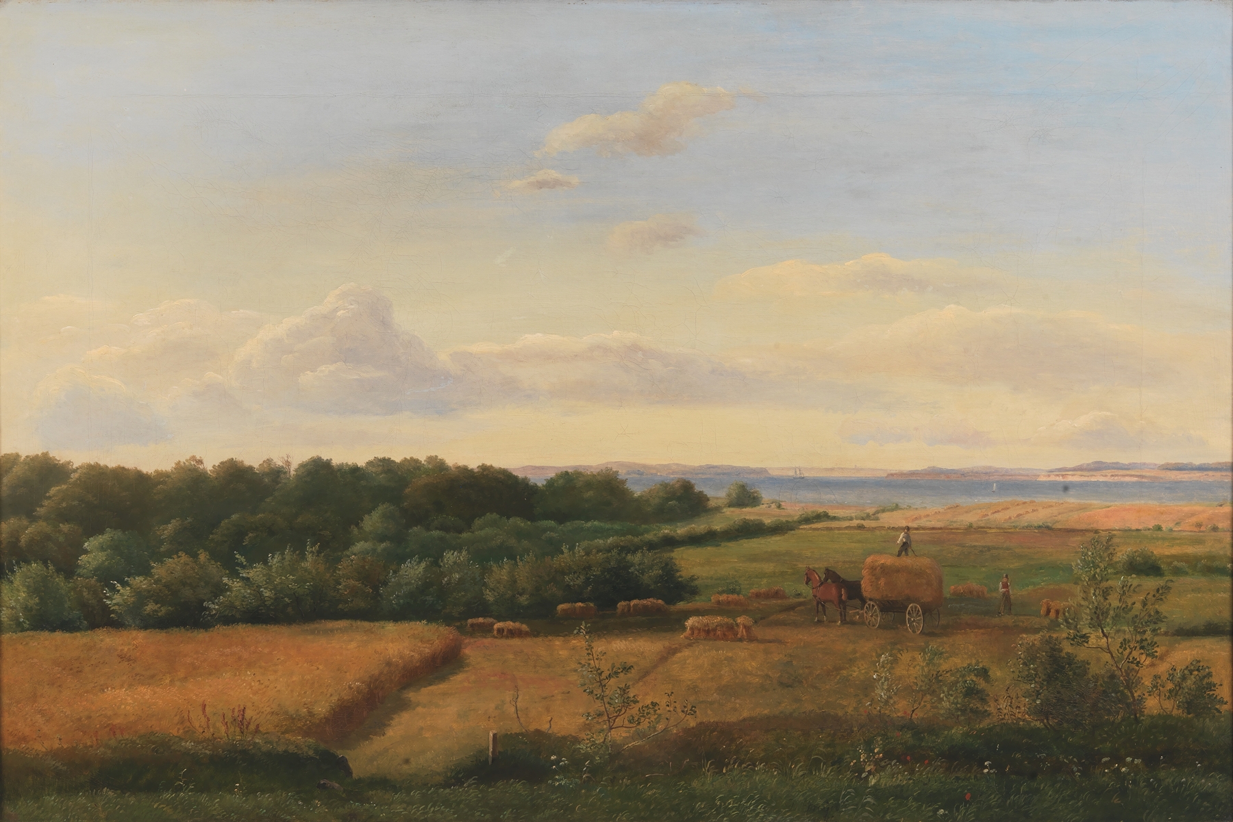 A Funen Landscape at Harvest Time, oil on canvas by Dankvart Dreyer, featuring golden fields and hills.