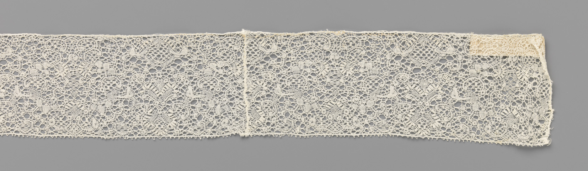Lace work by Unknown Artist featuring geometric patterns and ribbons, c. 1700